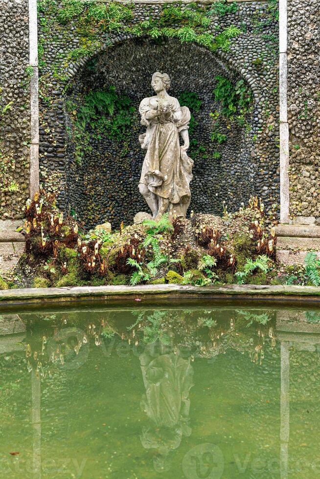 detail of a statue placed at the base of the amphitheater in the Borromean botanical gardens in Isola Bella on Lake Maggiore photo