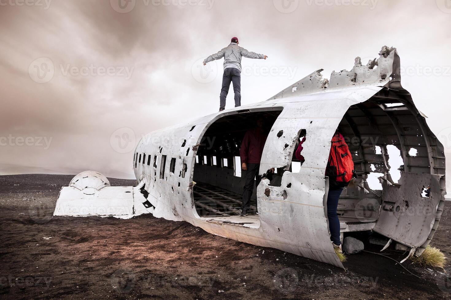 group of friends having fun walking over a plane photo