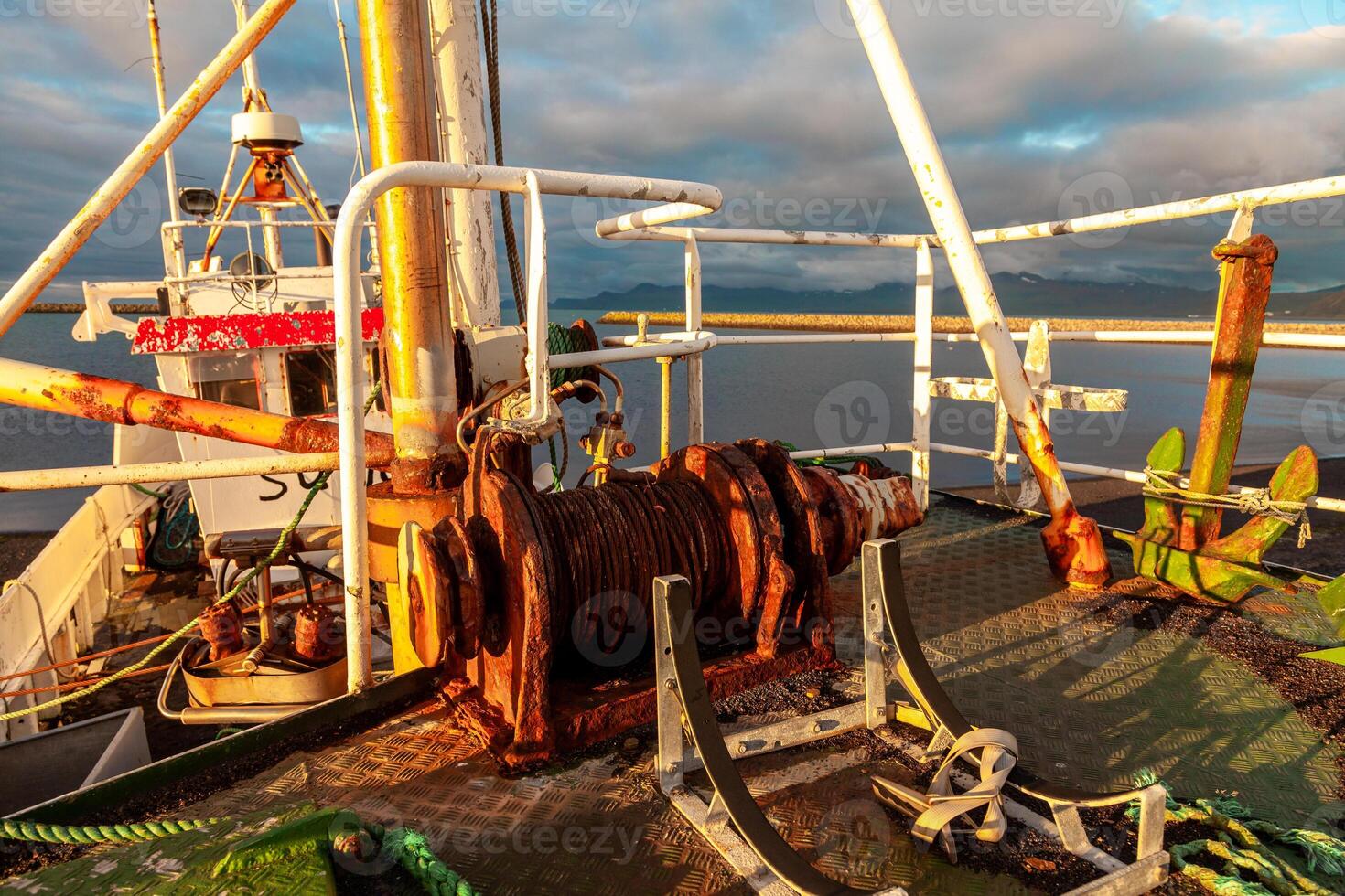 Abandoned vessel stranded on a beach on the Icelandic coast photo