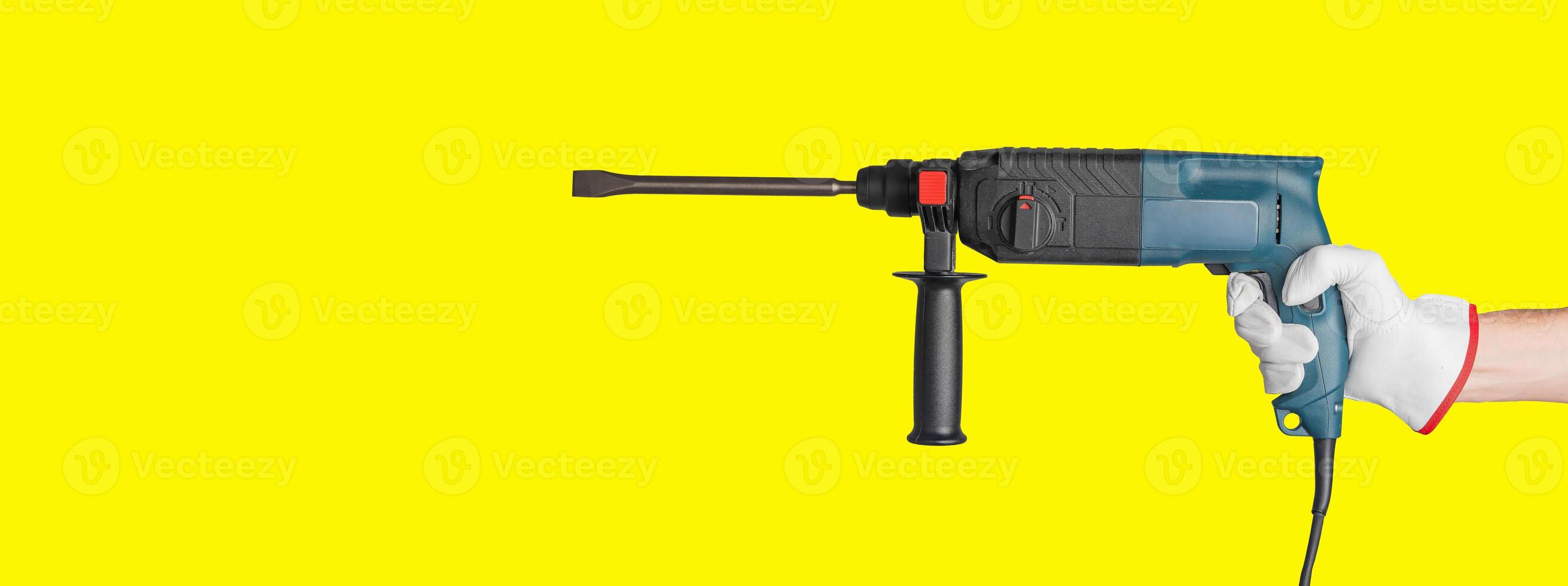Drilling tool for construction. Equipment for work repair with power. Industrial machine and photo