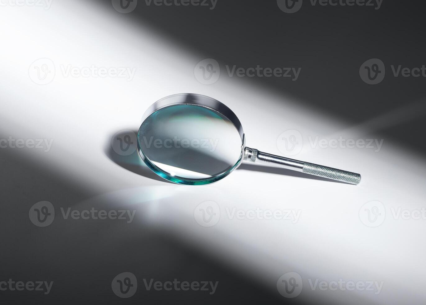 Business insights through data research with magnifying glass. Market analysis, financial audit, photo