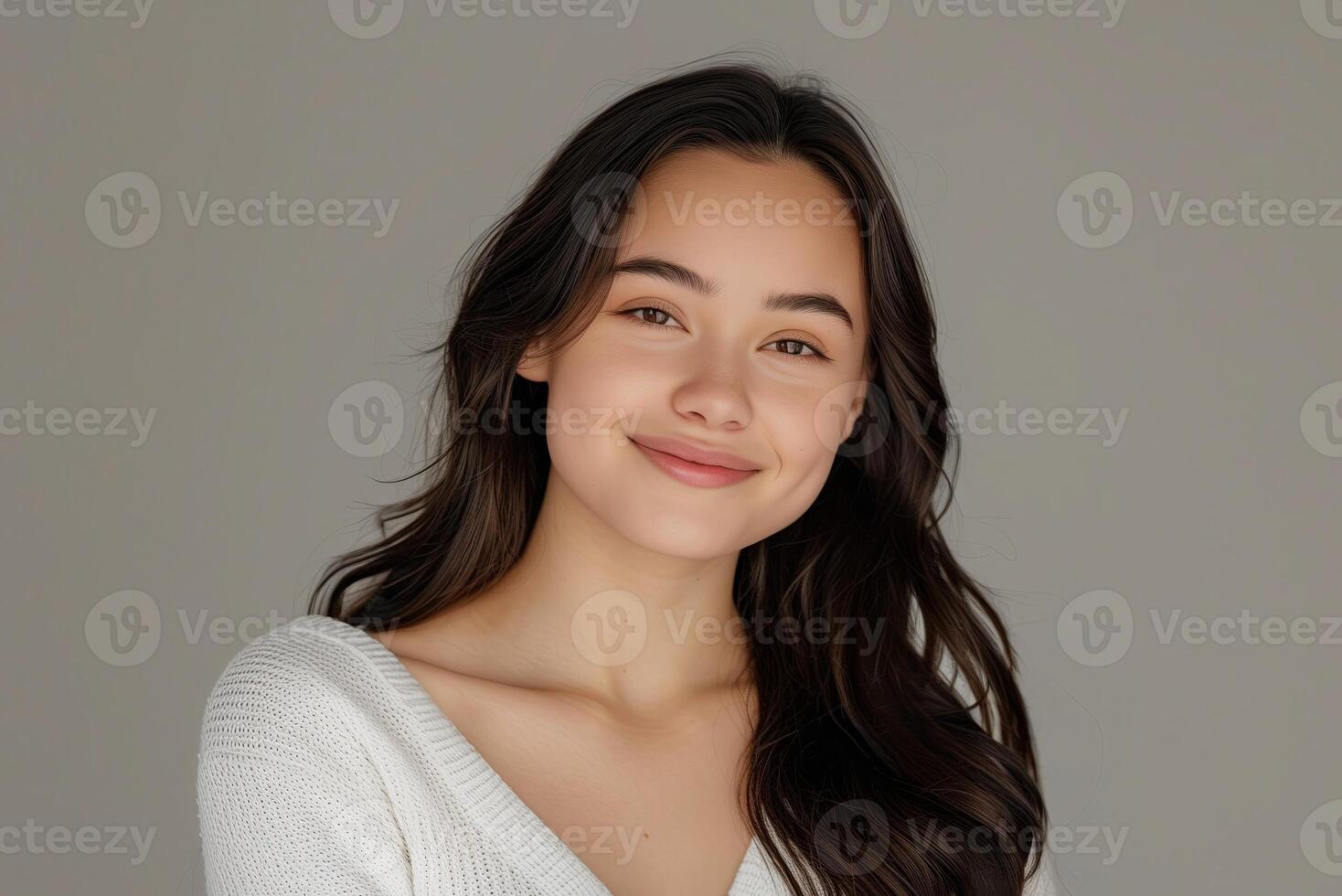 Portrait of a confident, attractive young woman. Happy, pretty smile, natural beauty, casual style. photo