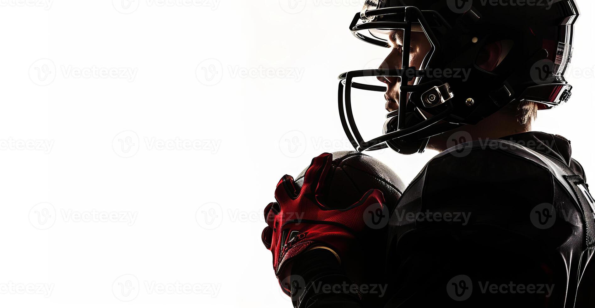 An American football player with a ball in his hands stands with his left side on a white background. Place for the text on the left photo