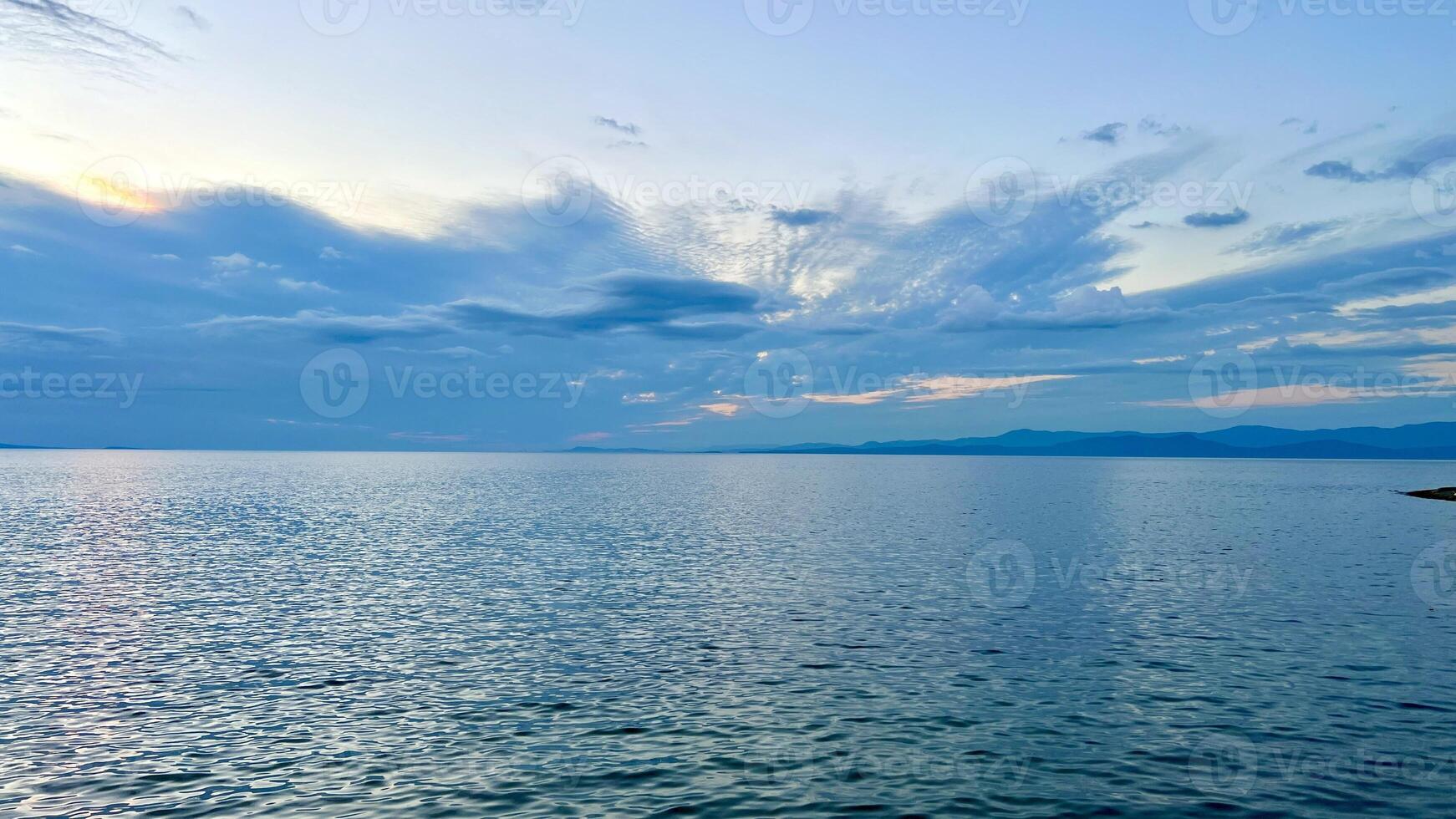 drift ice in the sea of okhotsk Abstract sky and ocean nature background with blurred panning motion start the adventure. Motivational quote on the ocean background photo