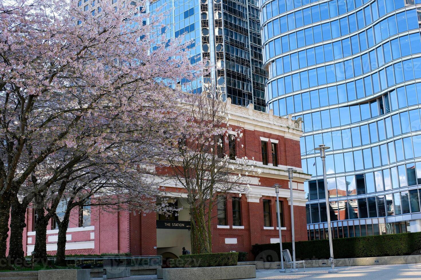 various recognizable places and attractions of Vancouver in Canada city center good weather clean downtown blue sky huge buildings skyscrapers many videos and photos of this topic British Columbia