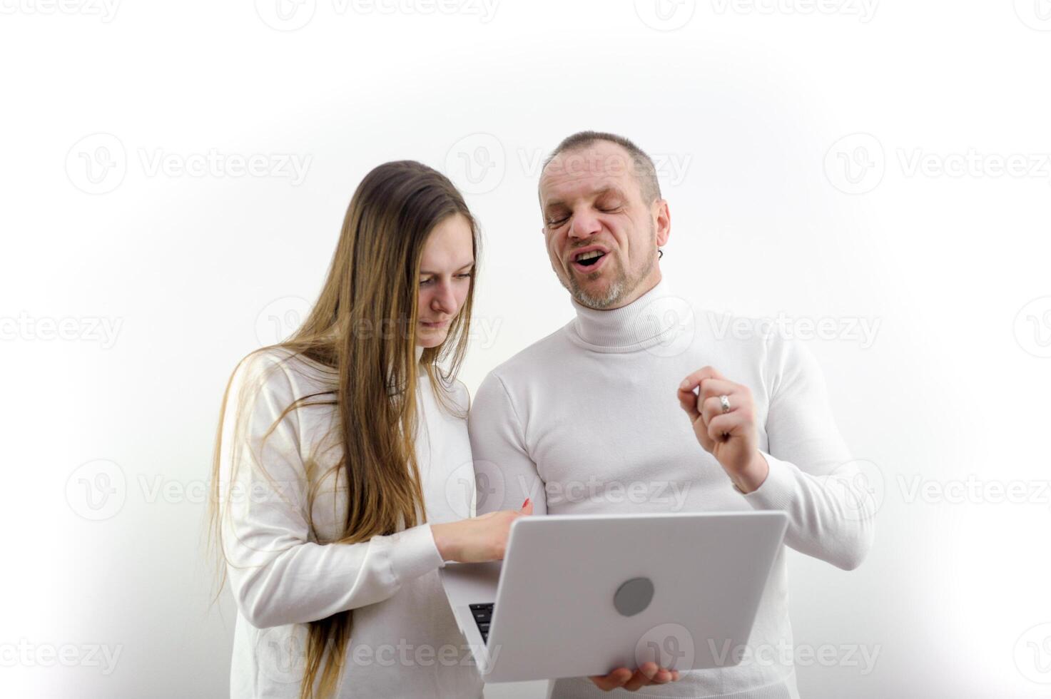man grimaced and screams telling woman how to use laptop tells student student how to write report abstract scientific degree to get university degree on white background laptop latest technology photo