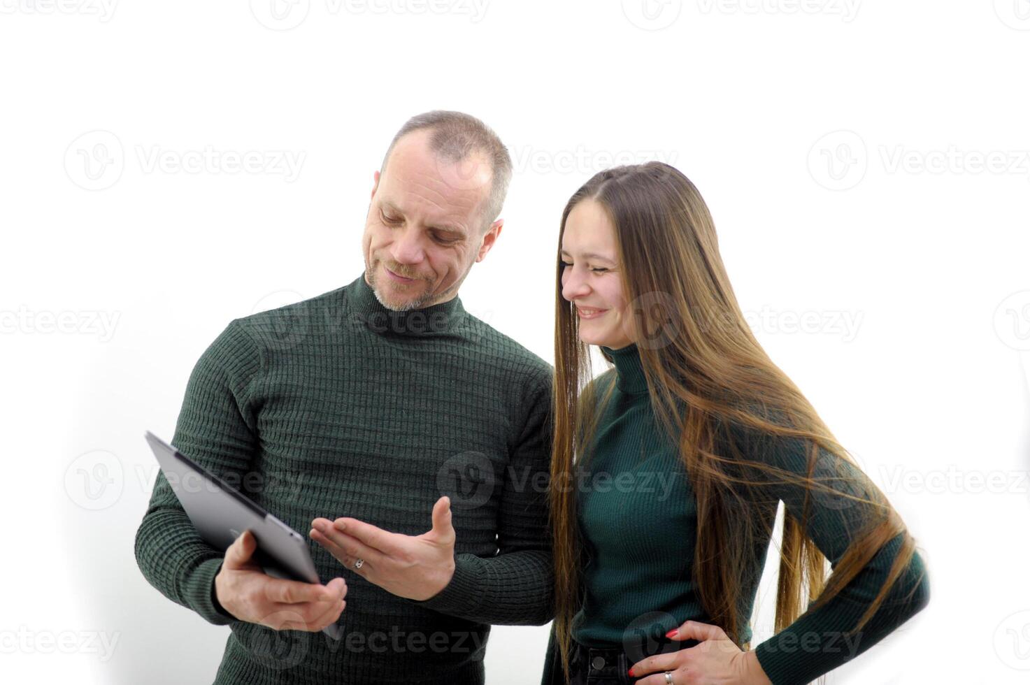 guy with a girl choose a computer inspection of a new gadget purchase communications internet photo