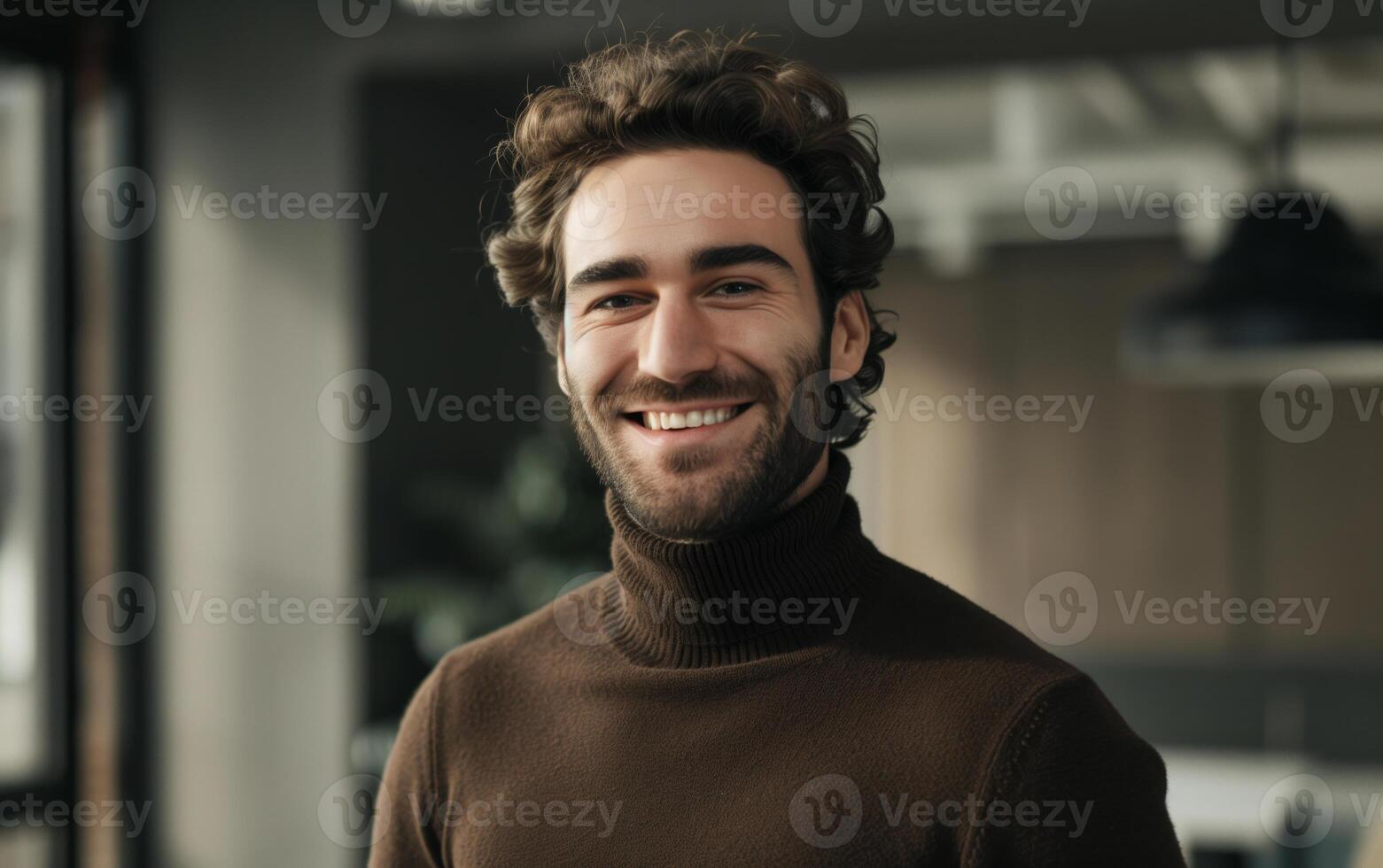 A smiling man with turtleneck standing in modern office photo