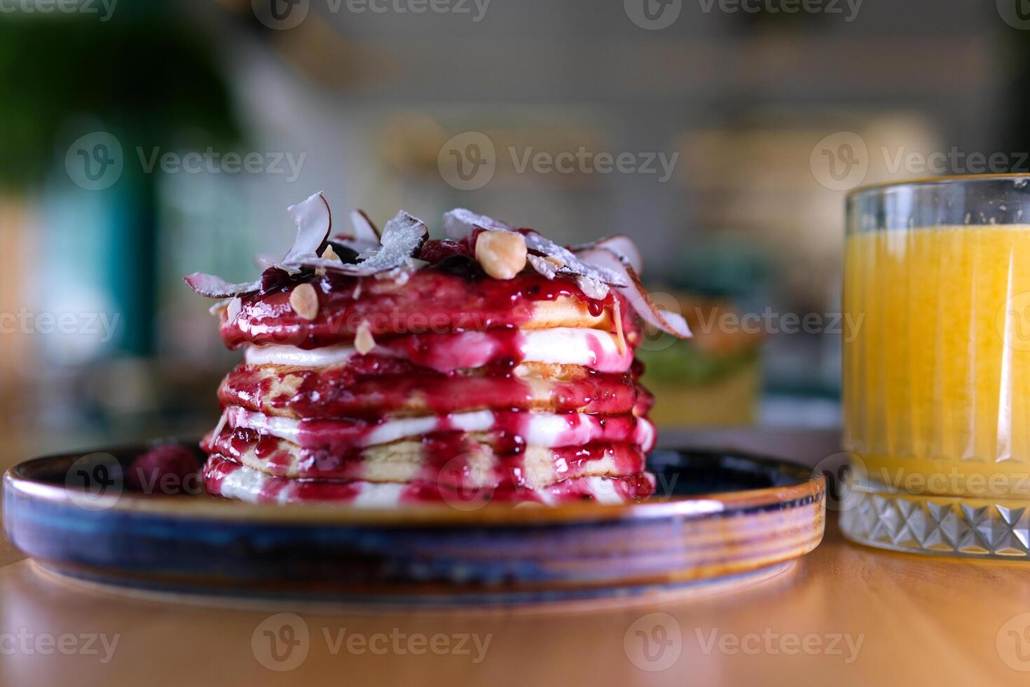 4K Closeup view of Stack of pancakes with chocolate, honey, strawberry, blue berry on top in plate, delicious dessert for breakfast. photo