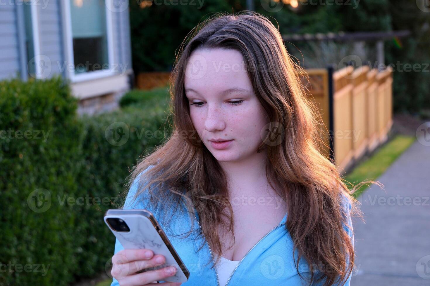 Young women are watching smartphones with stress. Online communication that is not happy is not successful. photo