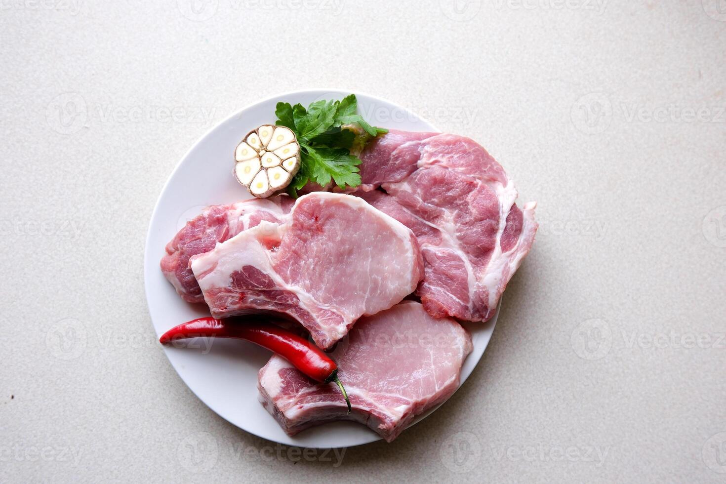 Set of various classic, alternative raw meat, veal beef steaks chateau mignon, t-bone, tomahawk, striploin, tenderloin, new york steak. Flat lay top view on white table background photo