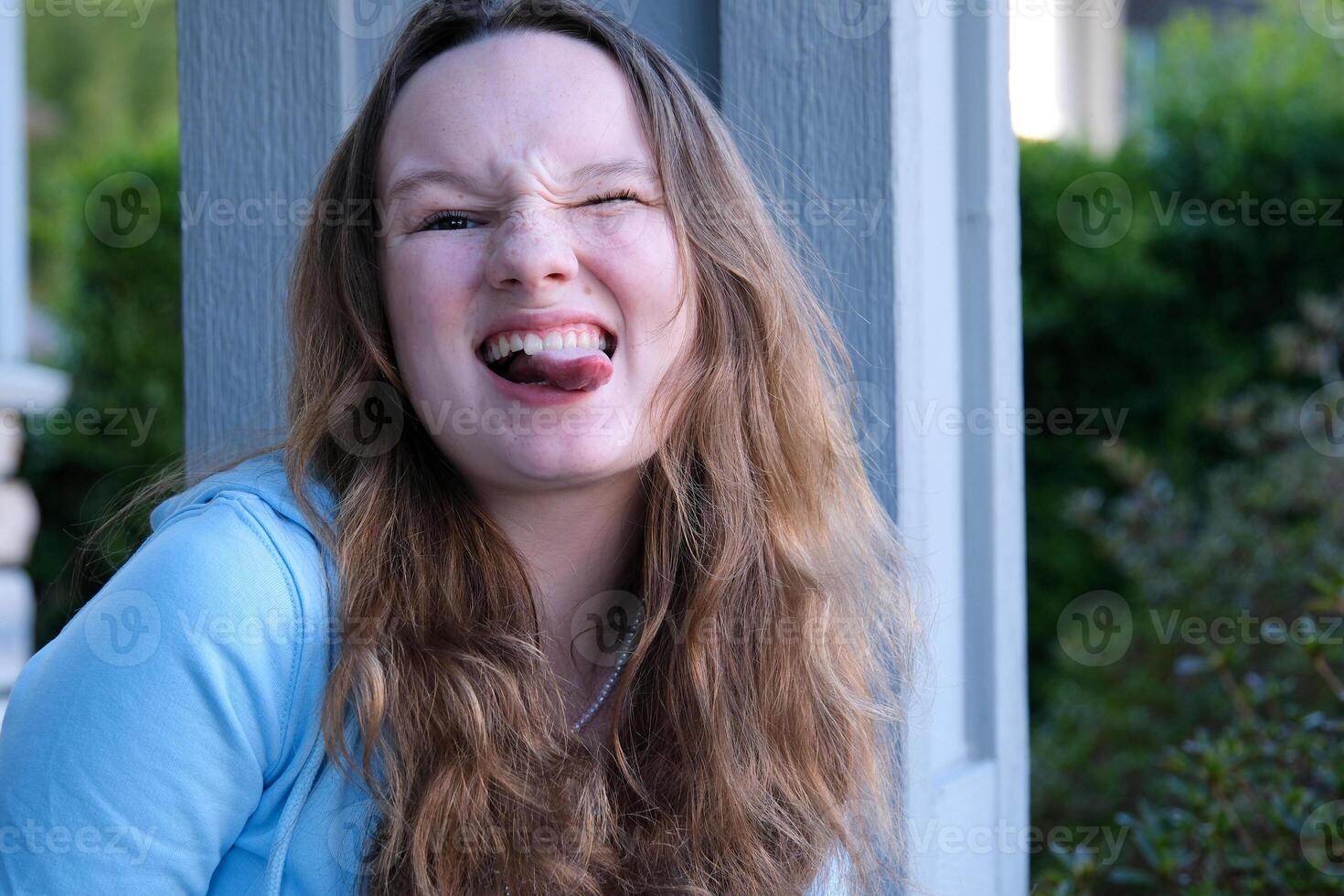 The woman showing facial expressions feeling displease photo