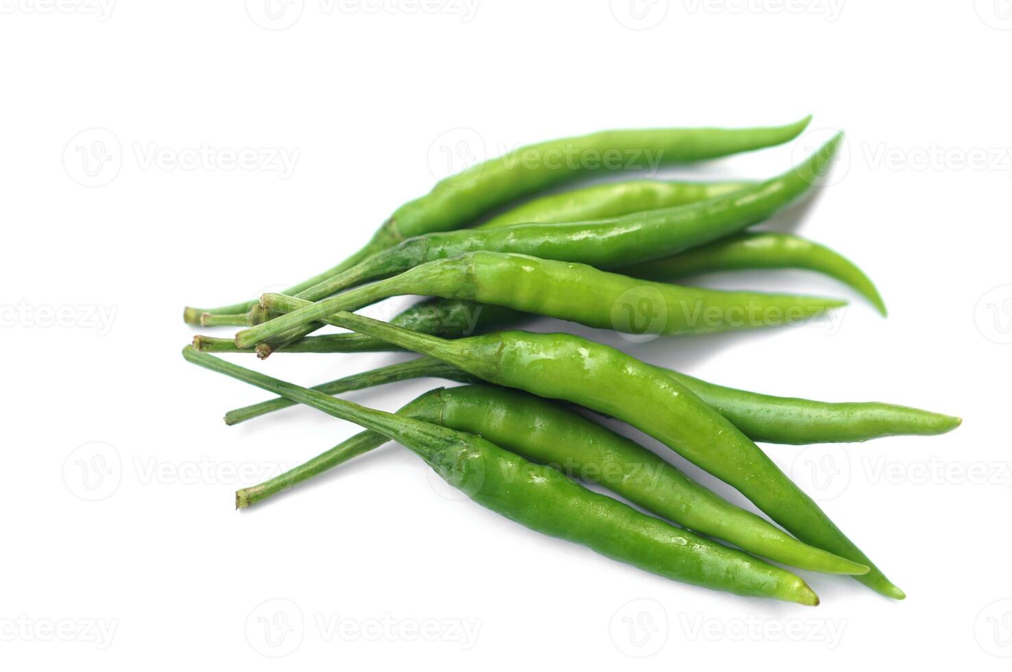 Green chillies isolated on white background. Concept, food ingredient for cooking. Spicy taste. Agriculture crops, organic vegetable has health benefits qualification. photo
