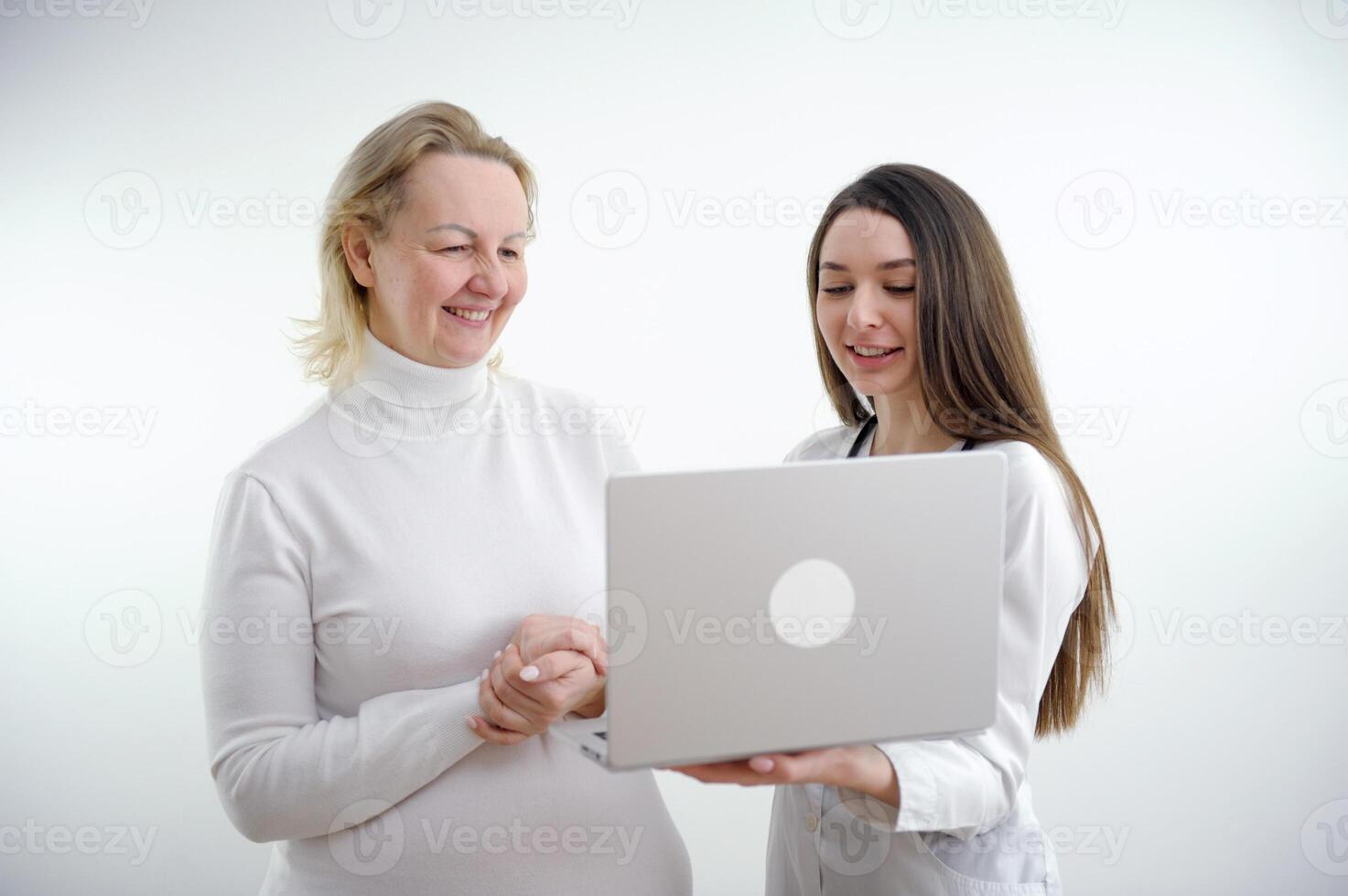 Doctor and patient discussing something while sitting at the table . Medicine and health care concept. Doctor and patient photo