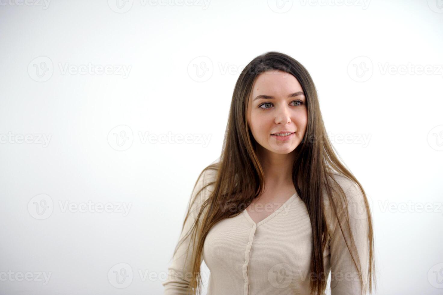 Young caucasian woman isolated on white background laughs out loudly keeping hand on chest. photo