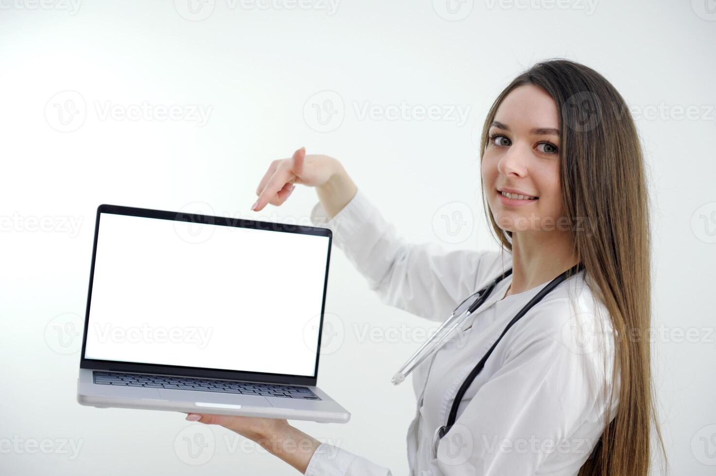 Woman doctor showing blank clipboard isolated on grey background. Woman doctor Nurse showing blank clipboard sign medical concept. Isolated on grey background photo