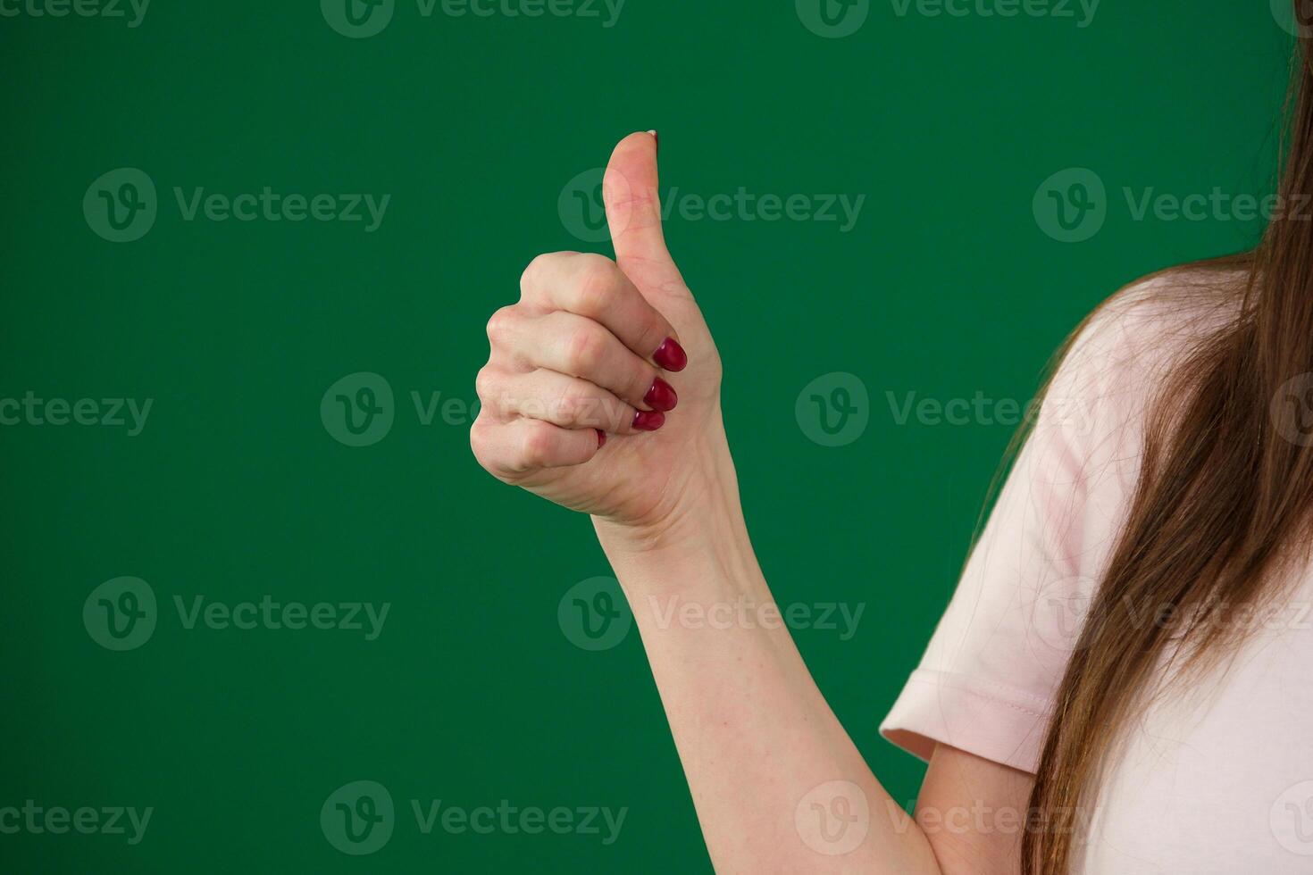 Thumb up hand gesture. Like internet symbol in real life. OK approval sign isolated. Empty copy space success background, Green Screen. photo