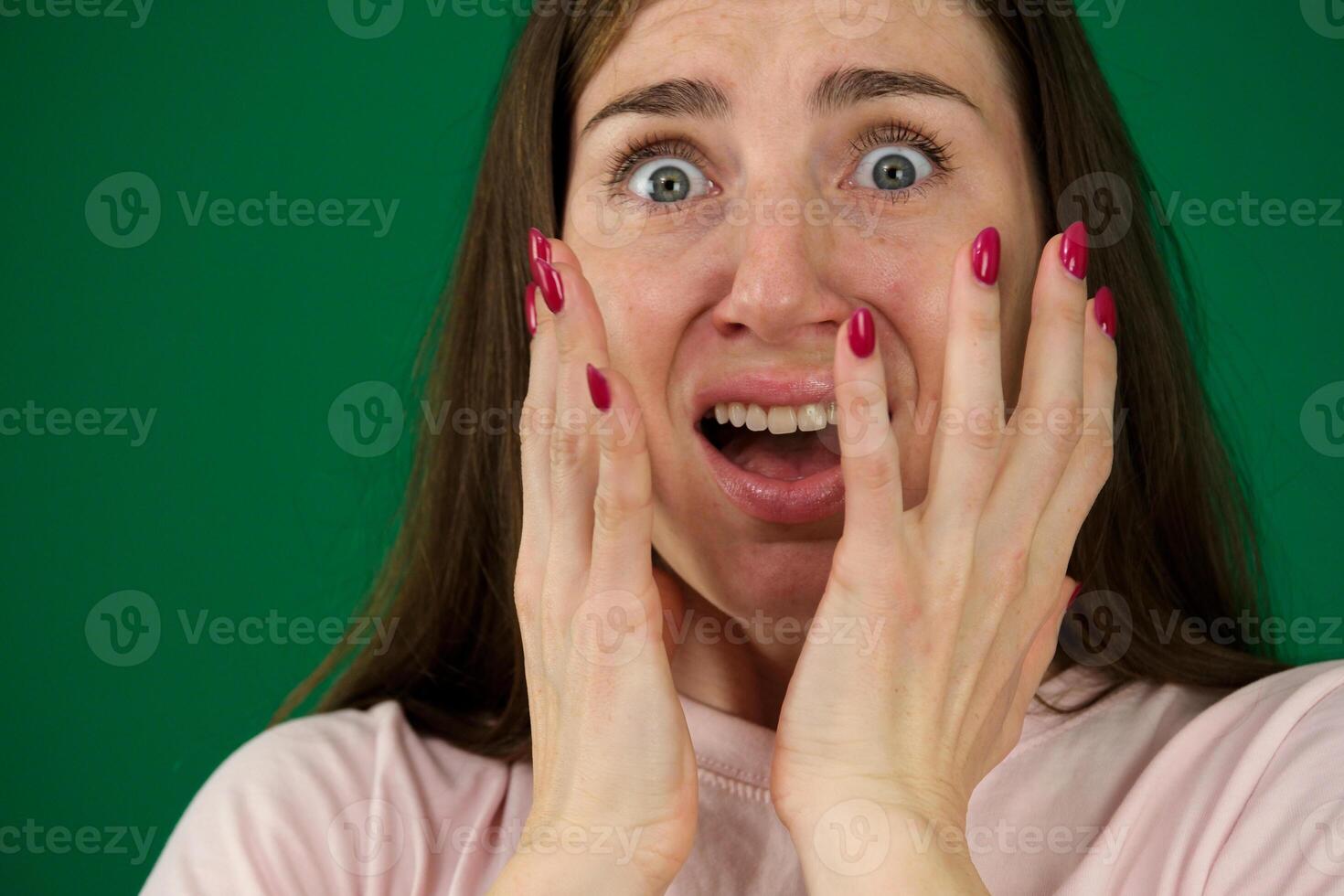 frightened mature woman with bulging eyes in fear, Facial Expressions, Very strong surprise or fright, horror in look, surprised, shocked by news, event photo
