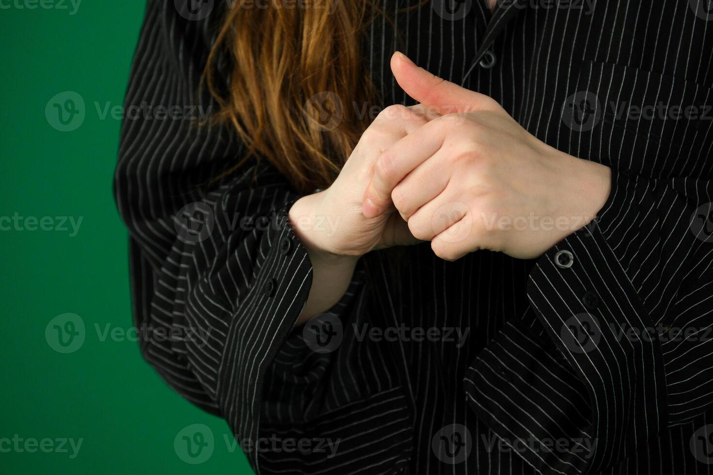 Close up of elderly woman sit on sofa with hands clenched joined on laps making difficult decision, pensive mature female thinking pondering, feel lonely or anxious at home or retirement house alone photo