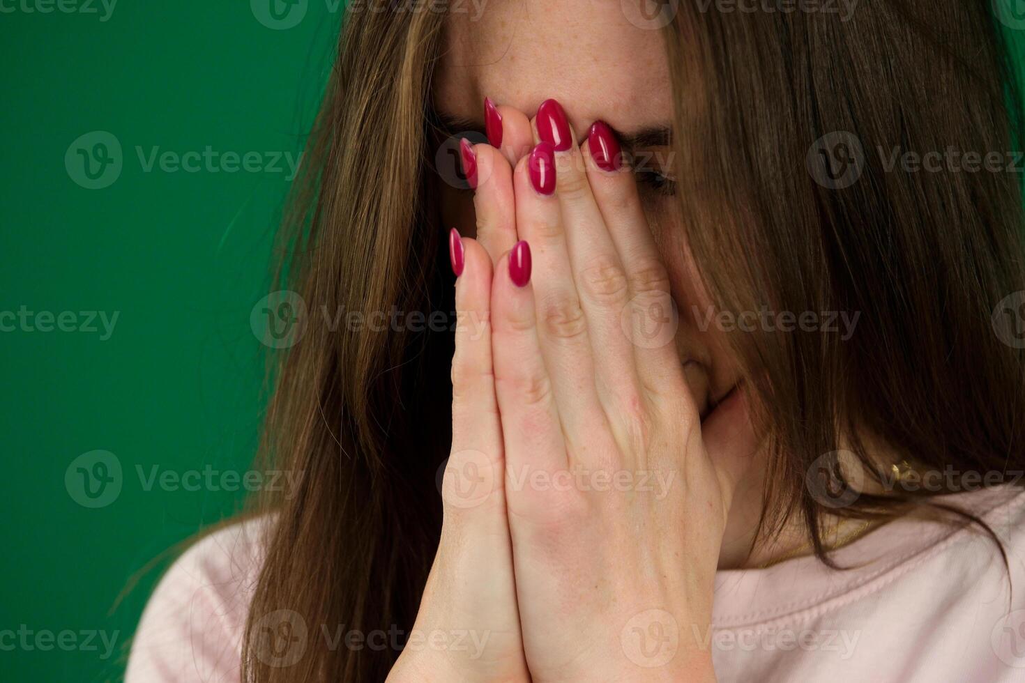 Suffering from anorexia. Girl is holding hands together like praying photo