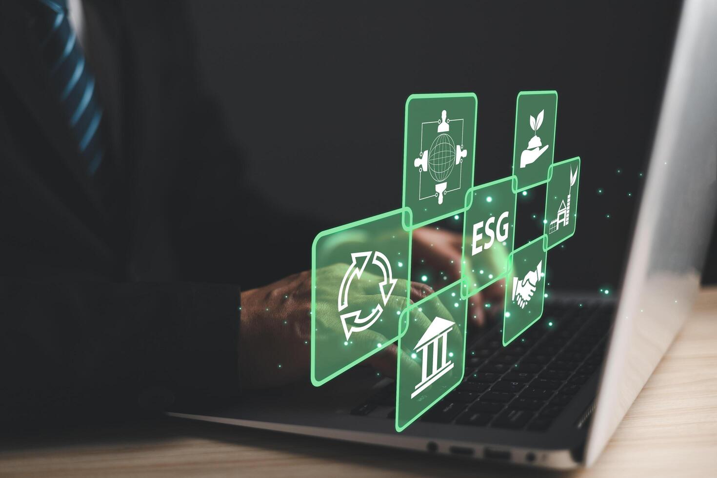 ESG for Environment Social and Governance. hand hold hologram screen to save energy,and reduce global warming,sustainable business investments,carbon credit,eco-friendly investment. photo