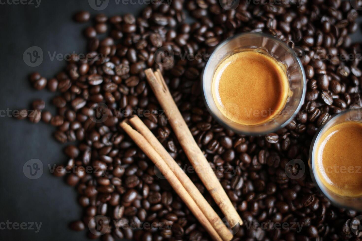 Coffee bean and espresso shot photo
