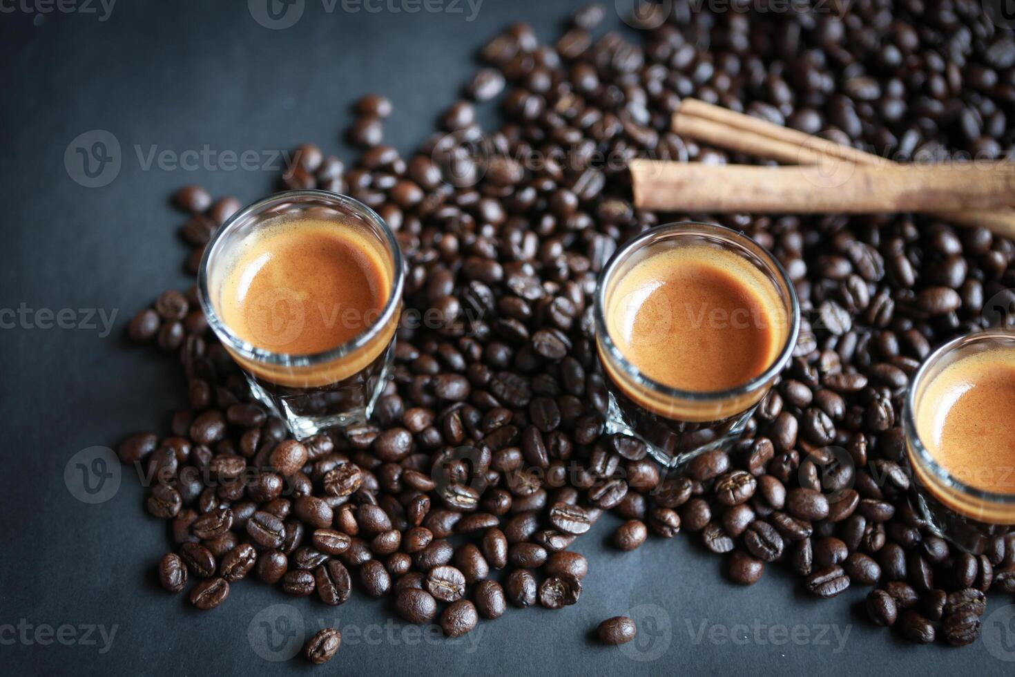 Coffee bean and espresso shot photo