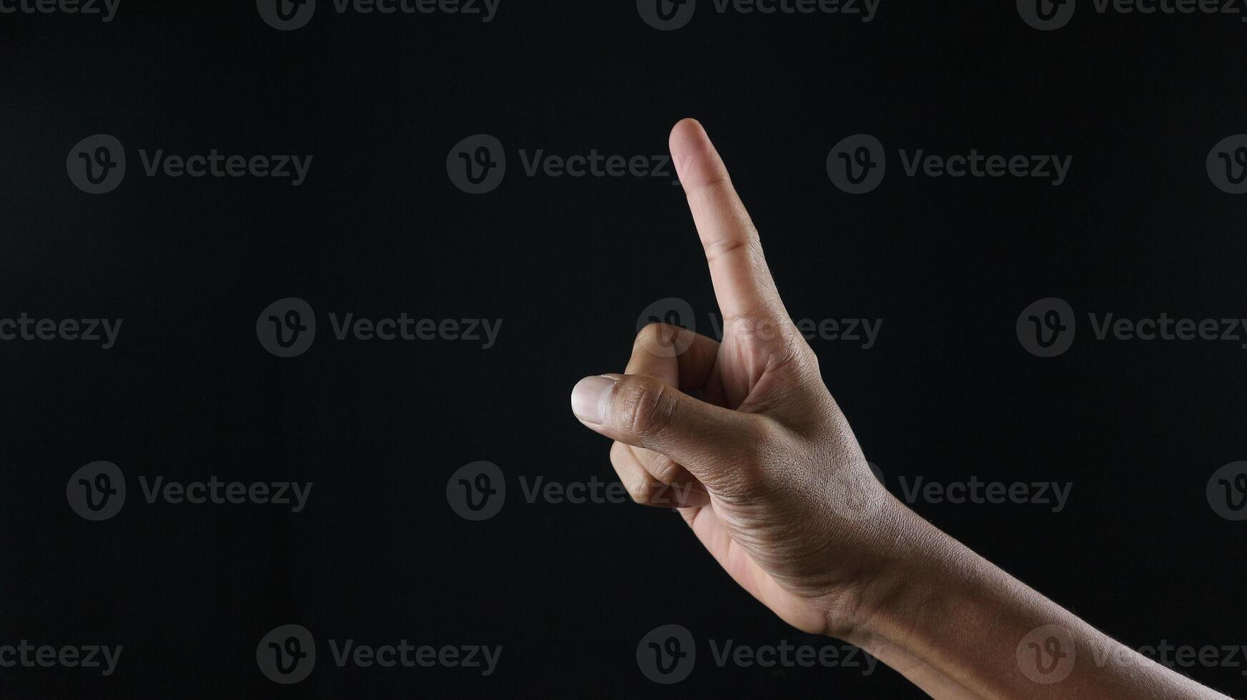 Number one index finger on white background photo