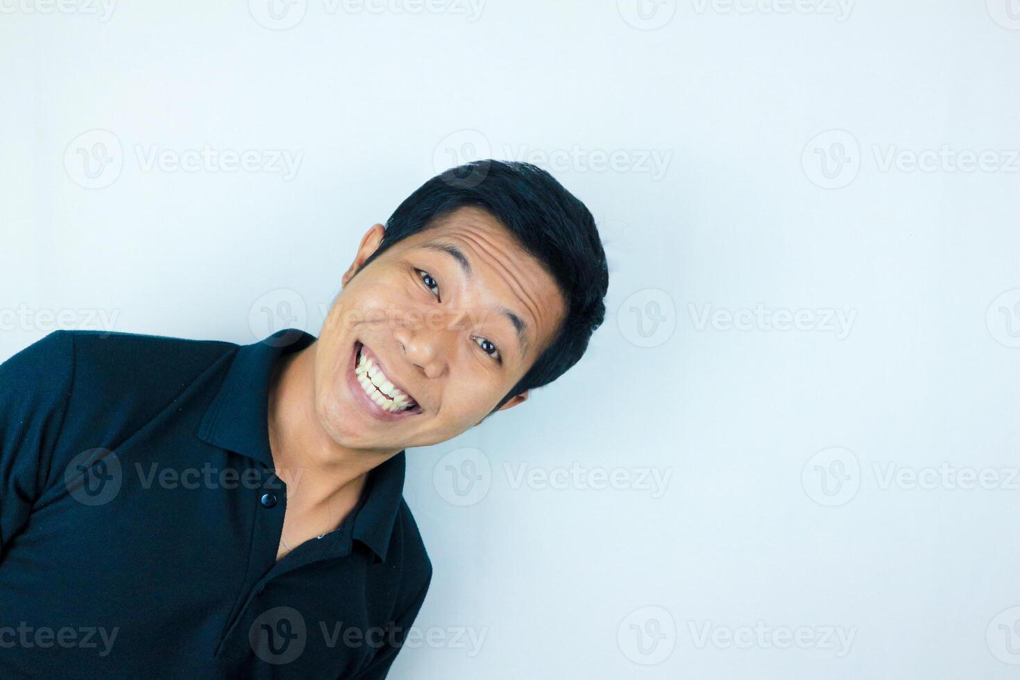 head shot happy facial expression smiling asian man looking at the camera, isolated white background photo