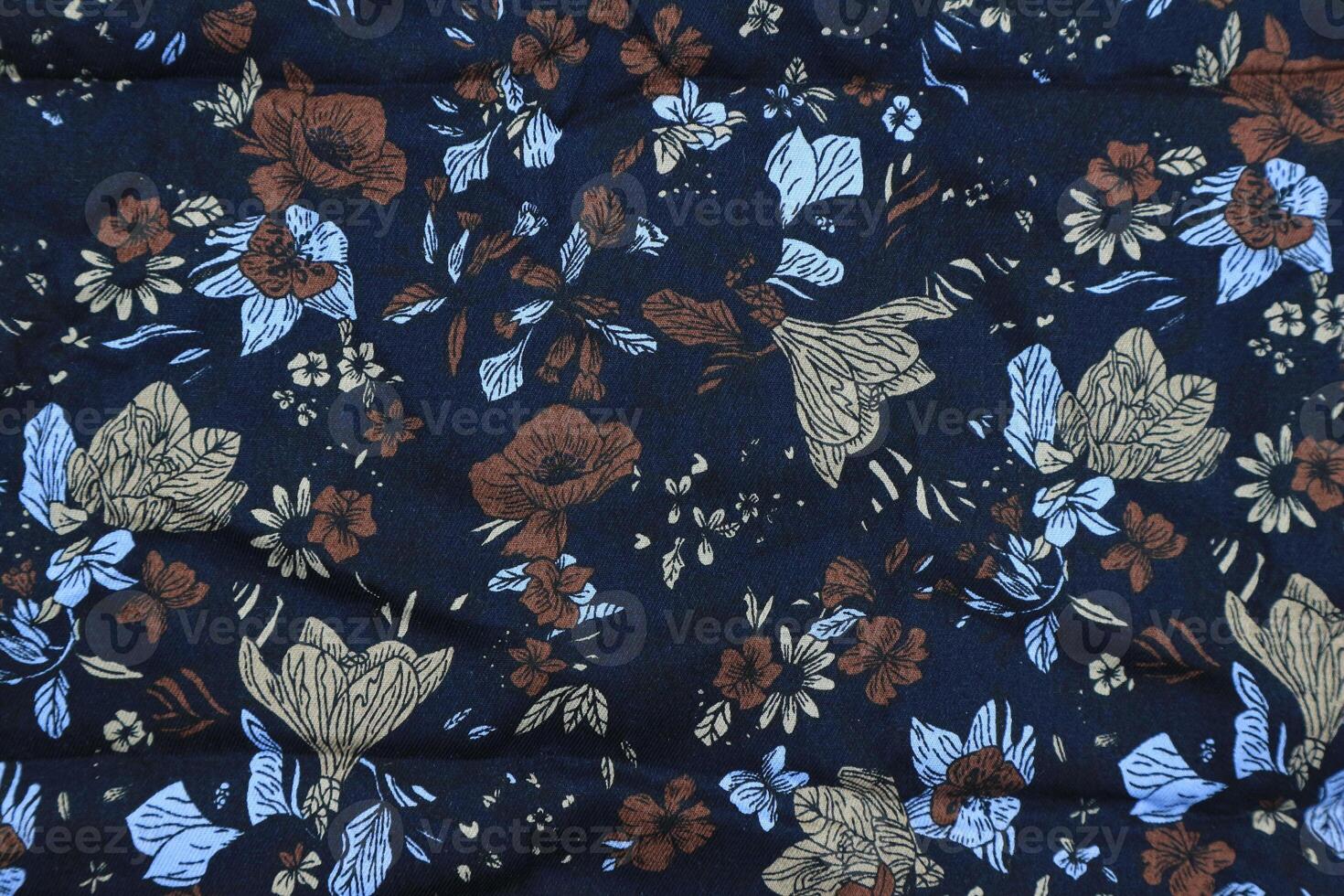 beautiful and colorful of art Indonesian navy color batik floral pattern photo