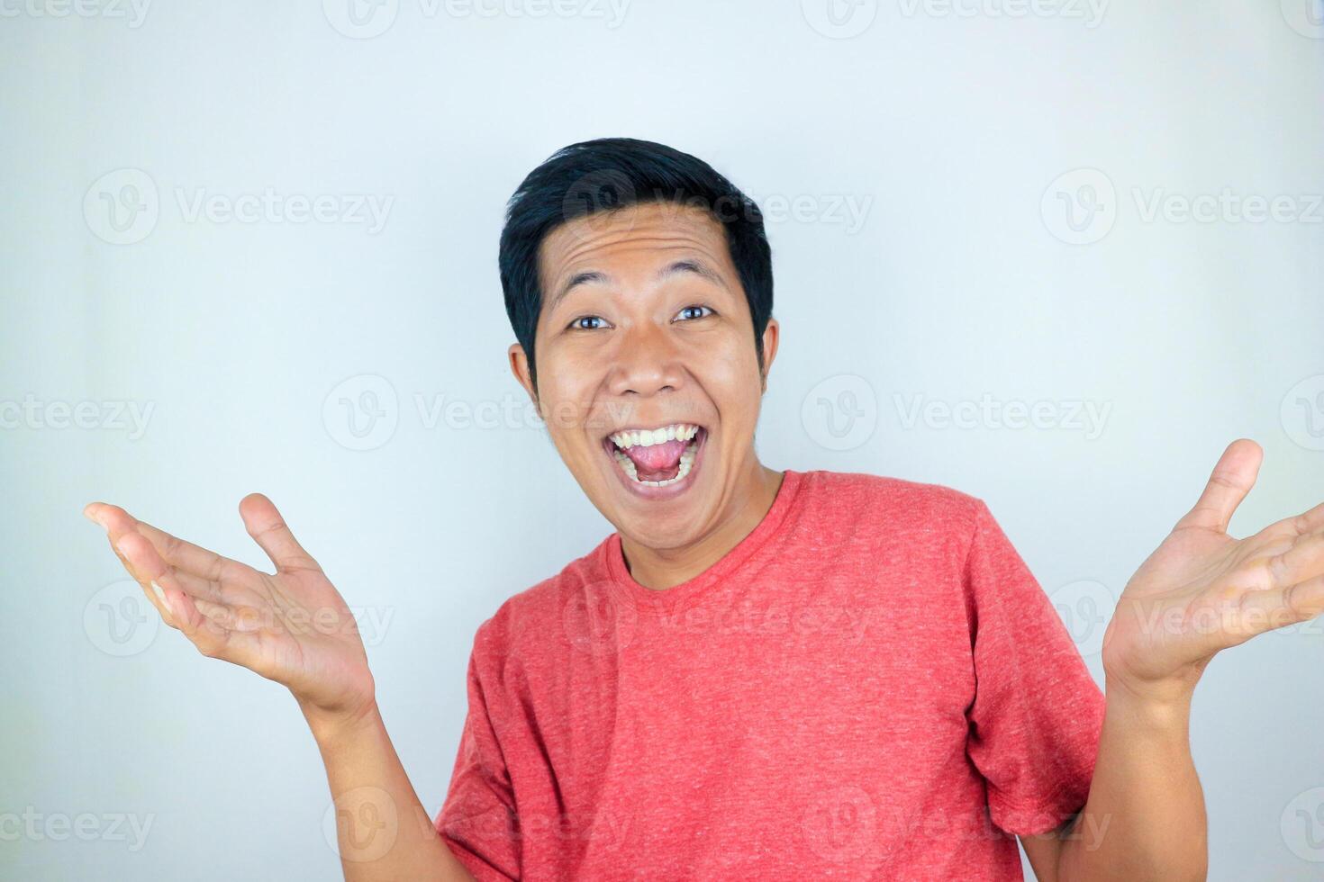 Surprised shocked face asian man isolated on white background for advertisement. photo