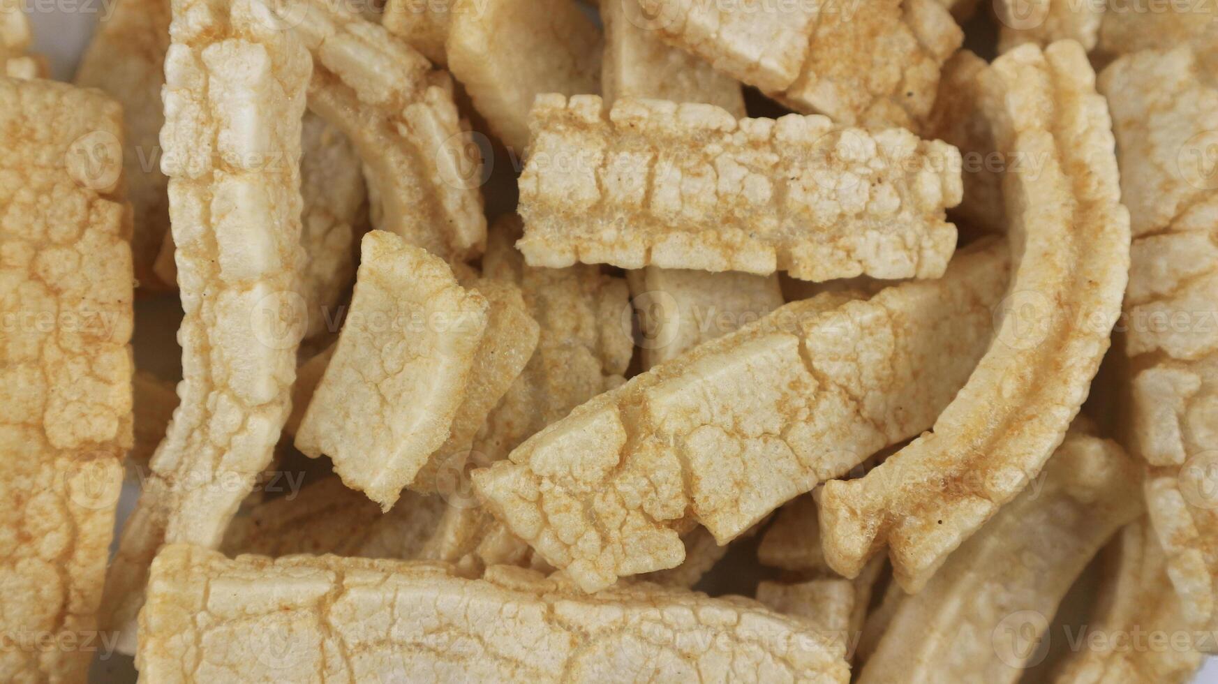 Rambak or kerupuk kulit sapi. Cow skin cracker is common side dish in Indonesia made from fried seasoned cow skin. perfect for recipe, catalog or any cooking contents. photo