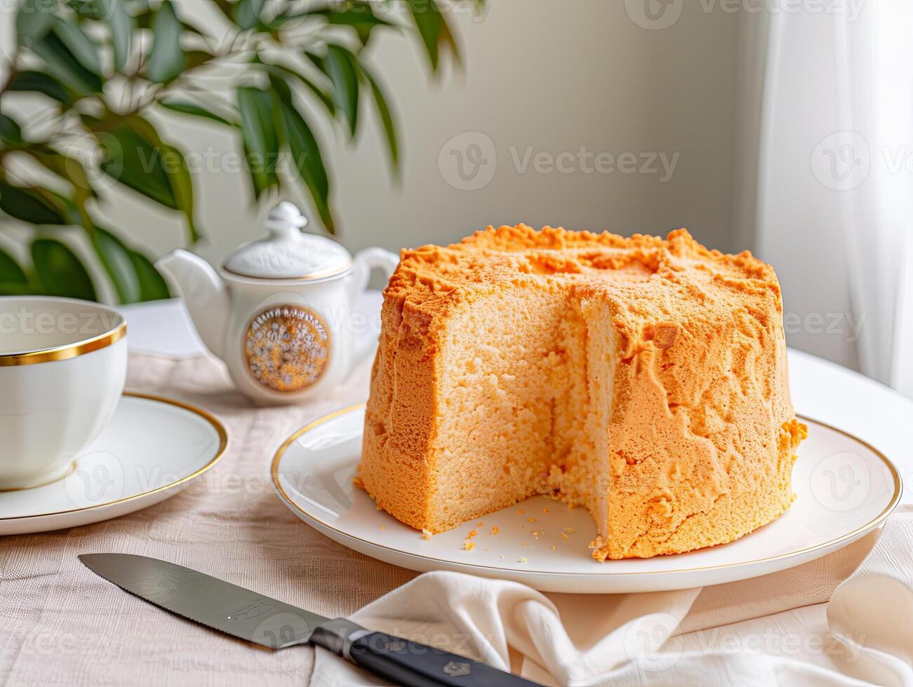 round matcha cake on a white plate photo