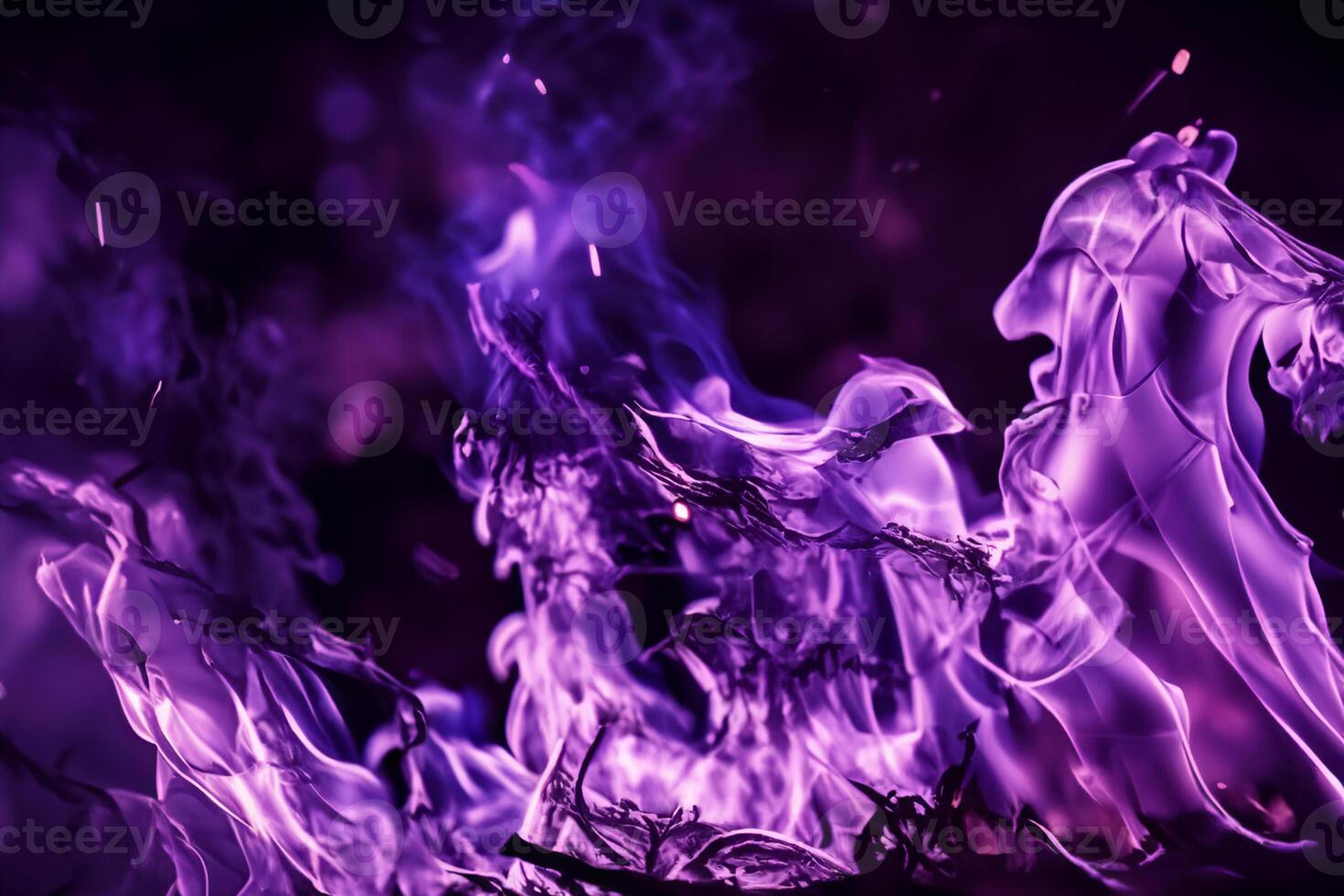 The Mesmerizing Purple Flames Dance Gracefully Against the Pitchblack Backdrop, Creating an Enchanting and Captivating Scene photo