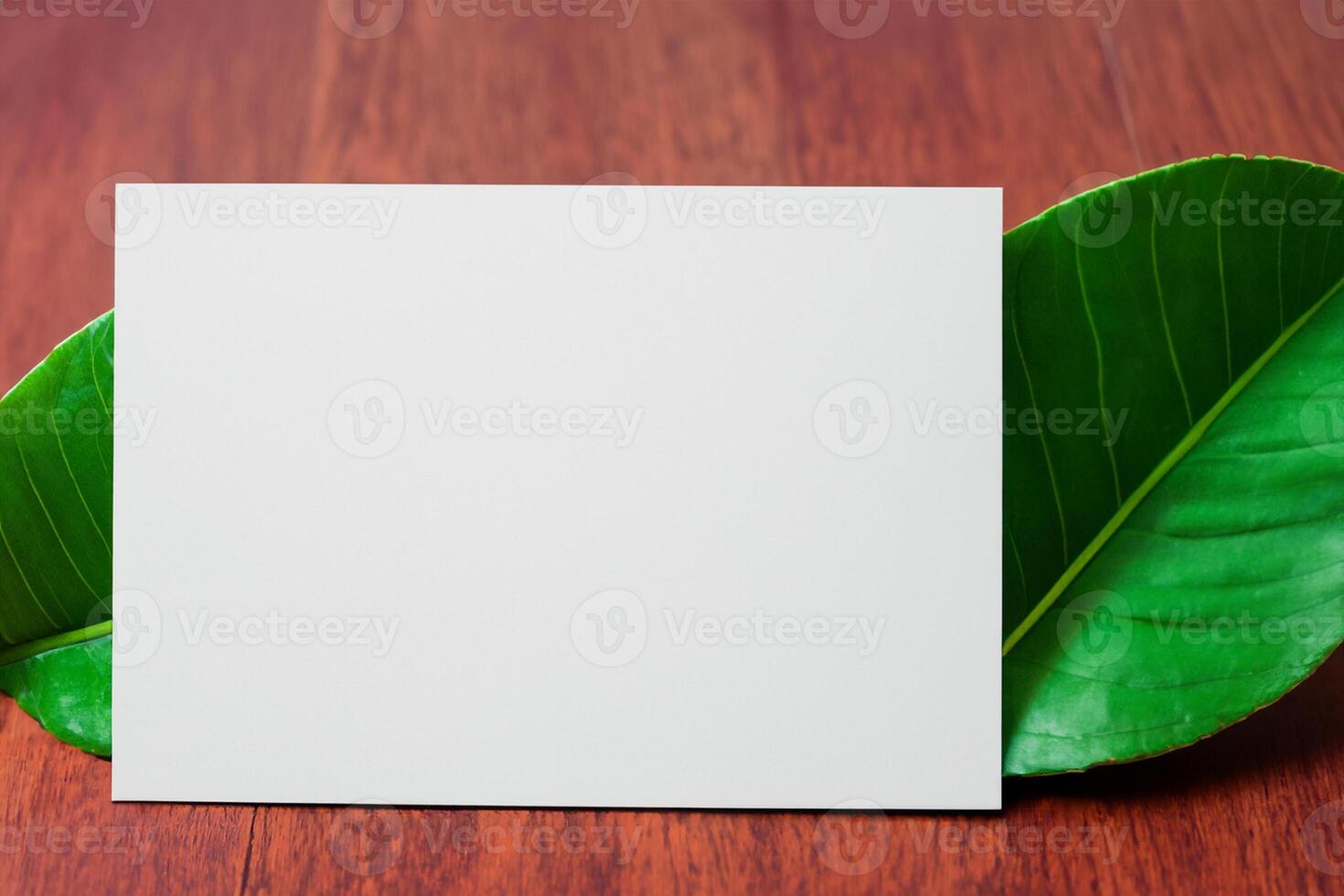 Beautiful Mockup Paper on Wooden Background Combined with Leaves, Creating a Charming and Natural Setting for Creative Designs and Artistic Presentations photo