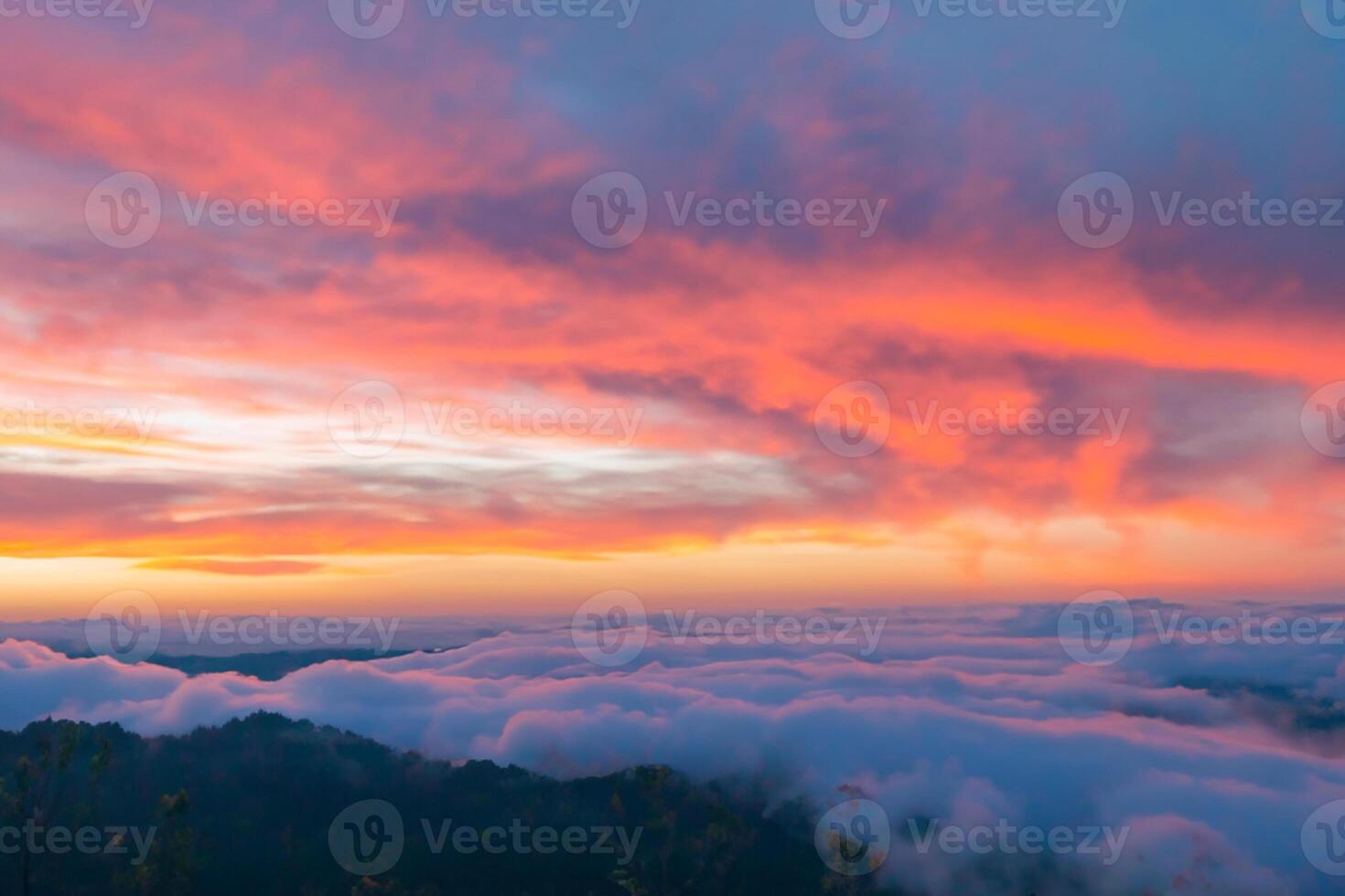 Beautiful Clouds Over the Mountains Create a Harmonious Atmosphere, Painting a Serene and Majestic Scene of Natural Beauty photo