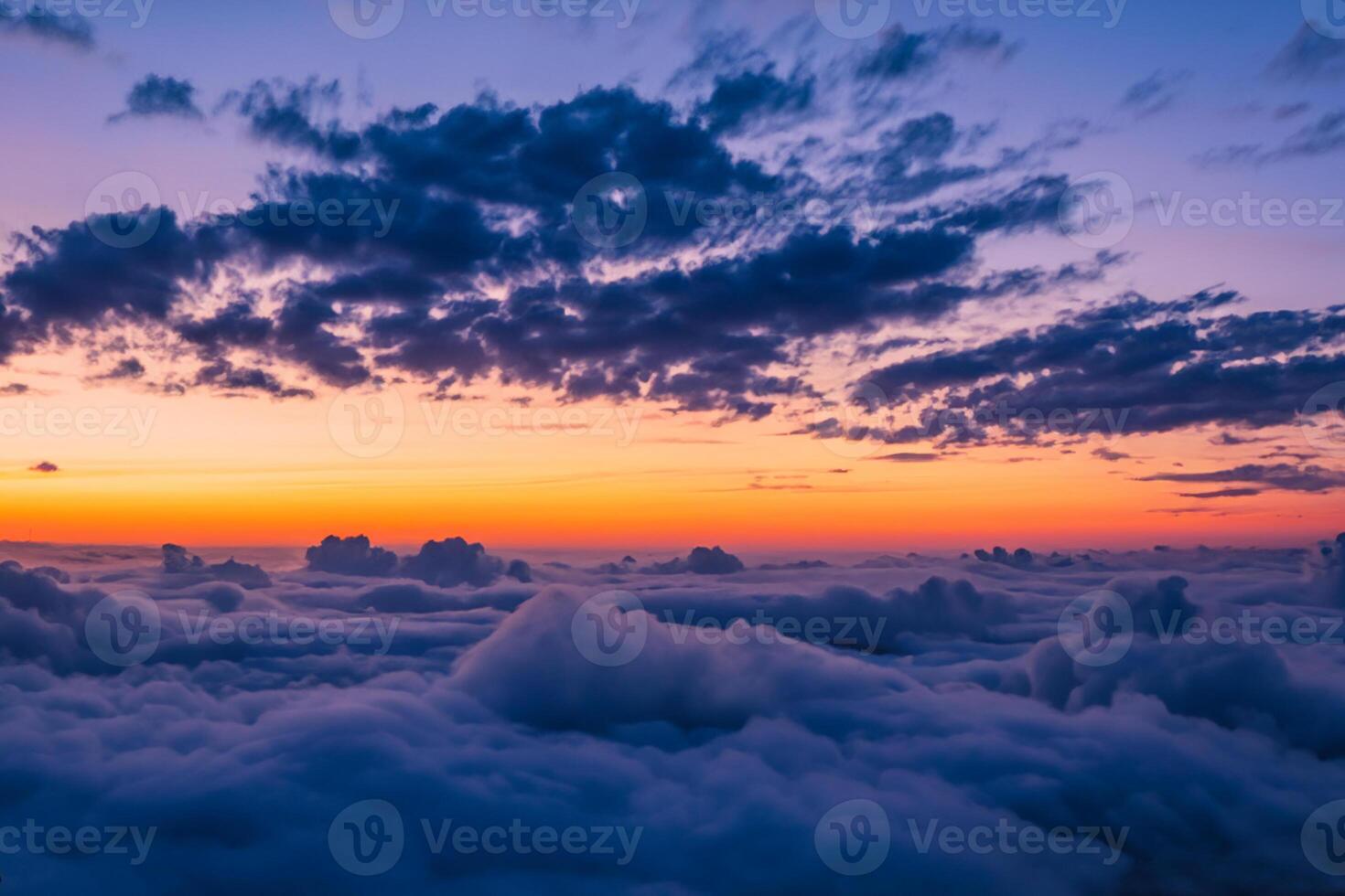 Majestic Sunrise Beautiful Clouds Over the Mountains Create a Harmonious Atmosphere, Painting a Serene and Majestic Scene of Natural Beauty photo