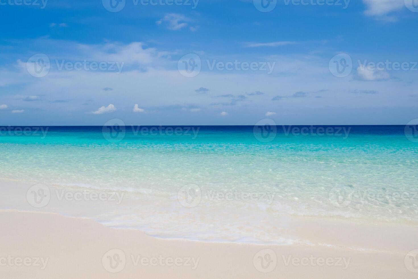 Beautiful Waves and Sands A Mesmerizing Display of Nature's Harmony, Where Crystal Clear Waters Meet Soft Golden Sands, Creating a Serene and Captivating Seascape That Enchants the Soul photo