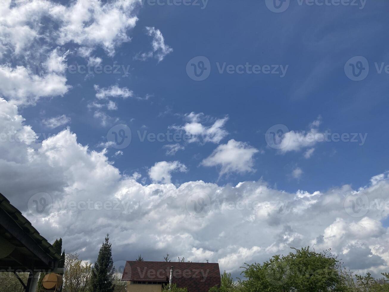 Thunderclouds before rain in the village photo