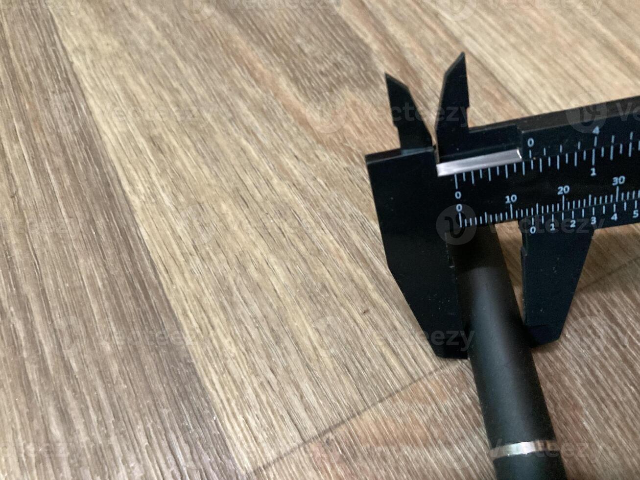 Caliper for measuring the dimensions of parts photo