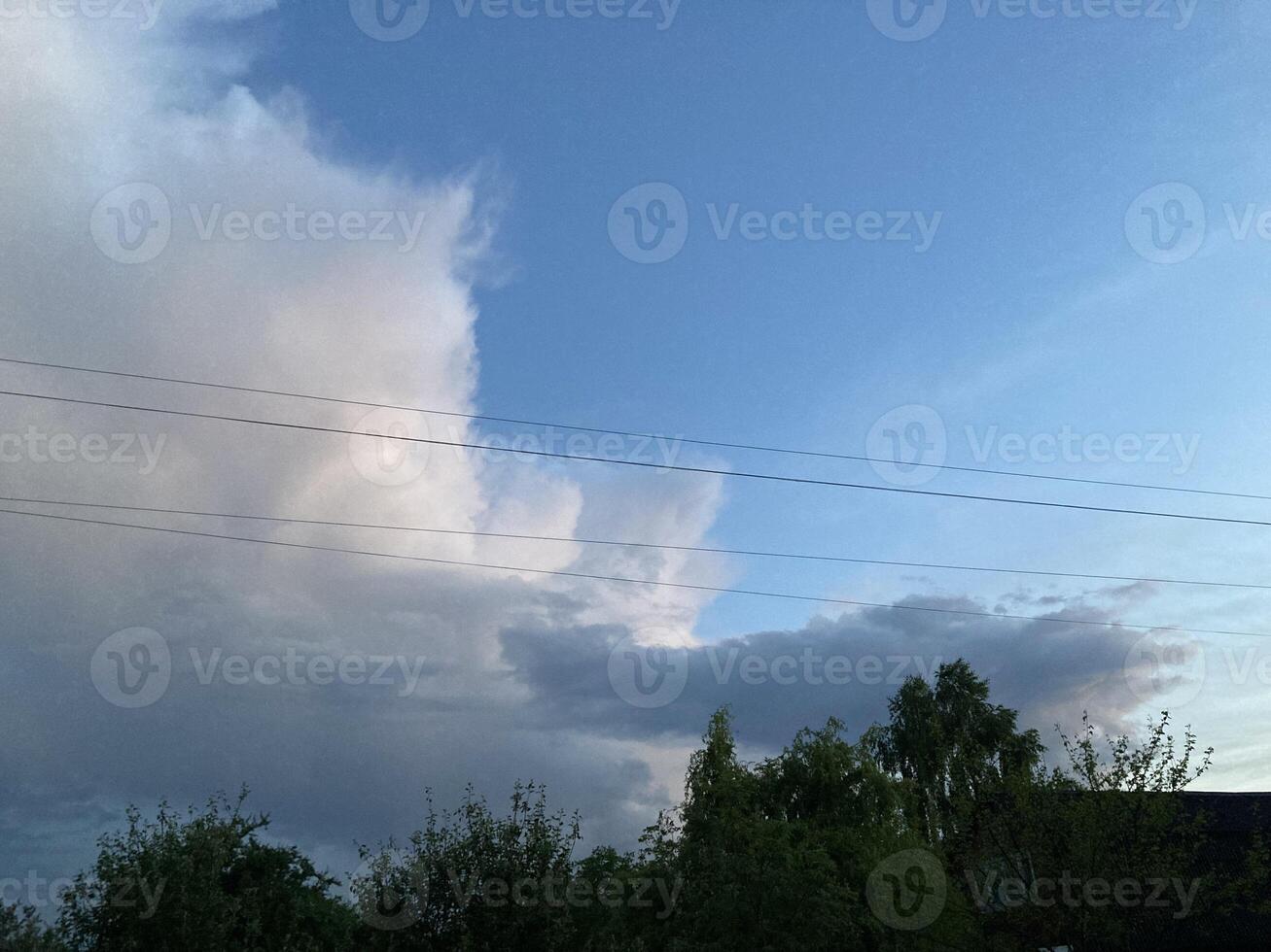 Clouds over countryside as weather changes photo