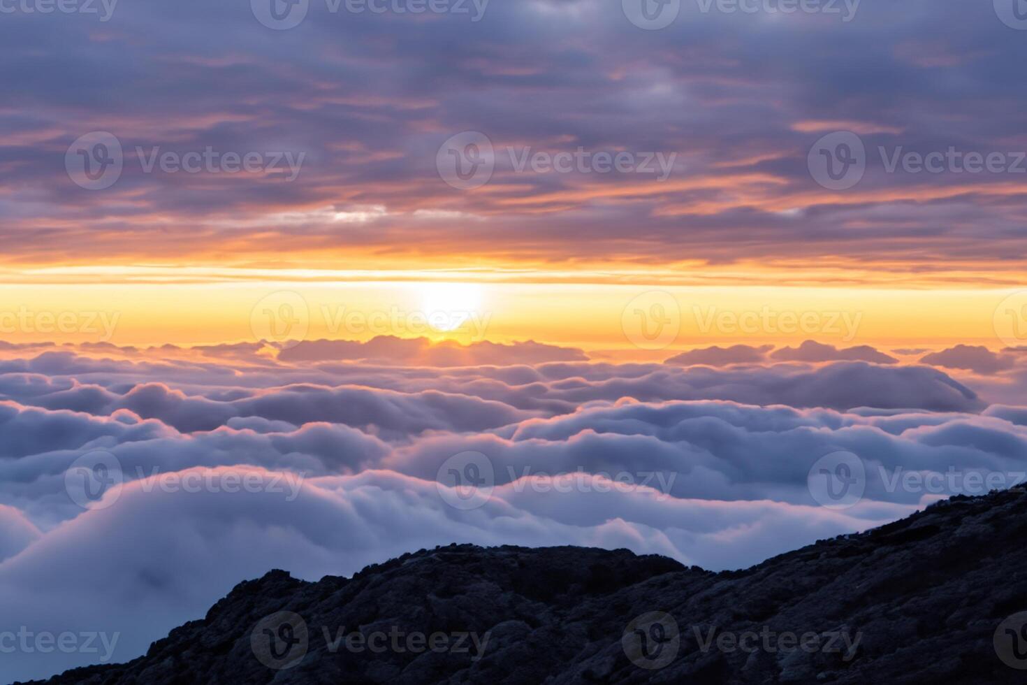 Beautiful Clouds Over the Mountains Create a Harmonious Atmosphere, Painting a Serene and Majestic Scene of Natural Beauty photo