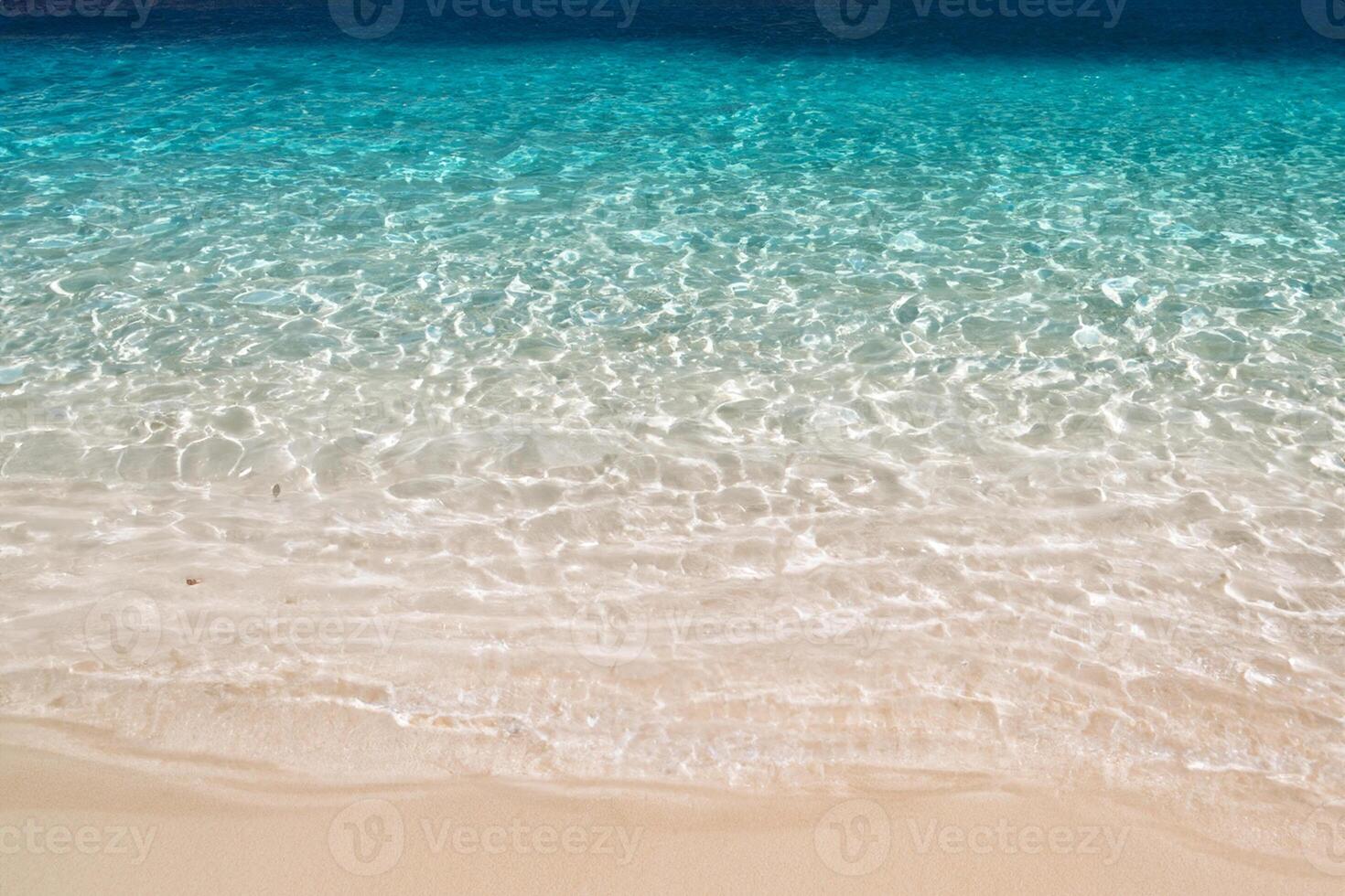 Beautiful Waves and Sands A Mesmerizing Display of Nature's Harmony, Where Crystal Clear Waters Meet Soft Golden Sands, Creating a Serene and Captivating Seascape That Enchants the Soul photo