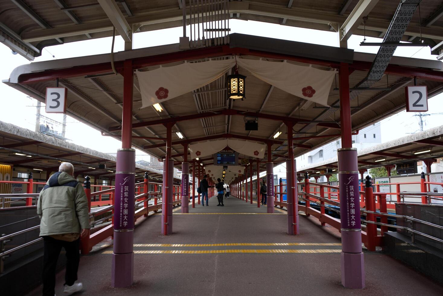 Fukuoka, Japan - December 11, 2022 - Entrance to the anciently decorated platform at Dazaifu photo