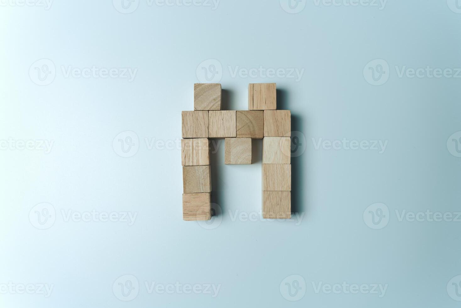 Letter M from wooden dice White Background photo