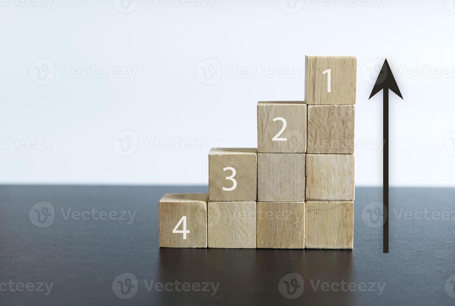 Wooden blocks with Icon percentage symbol and vertical arrow up. Interest rate financial and mortgage rates concept photo