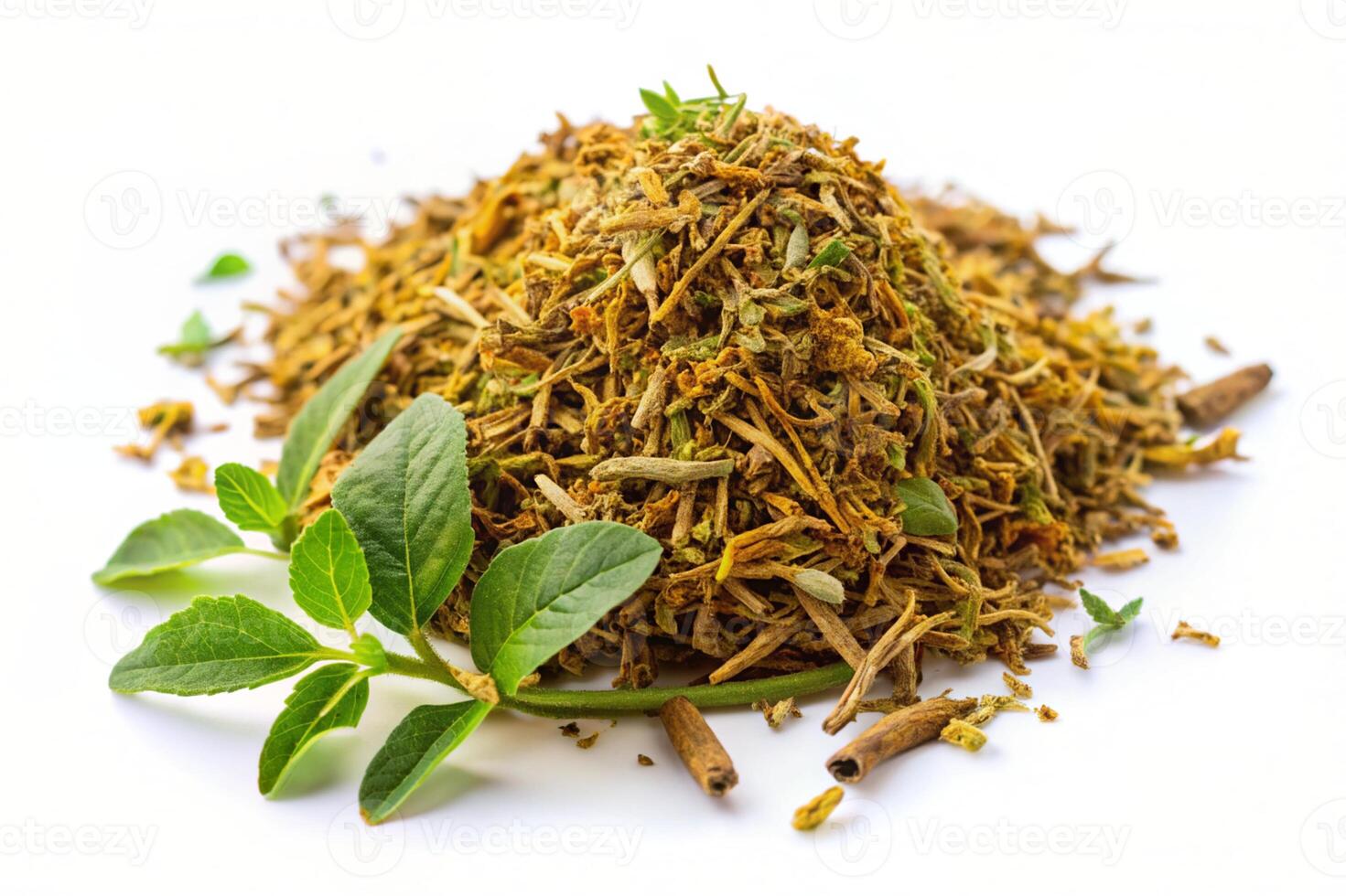 a pile of dried herbs and leaves on a white background photo