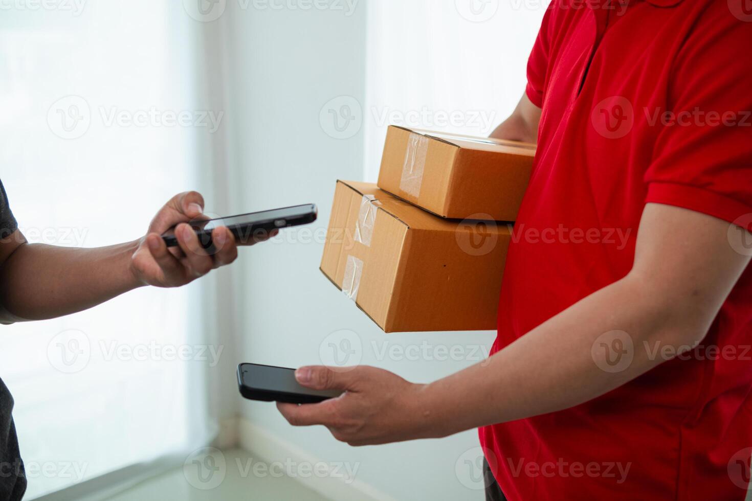 SME business operator is inspecting and packing products into parcel box for delivery company that will come pick up products after participating in online marketing with Application shopping online photo