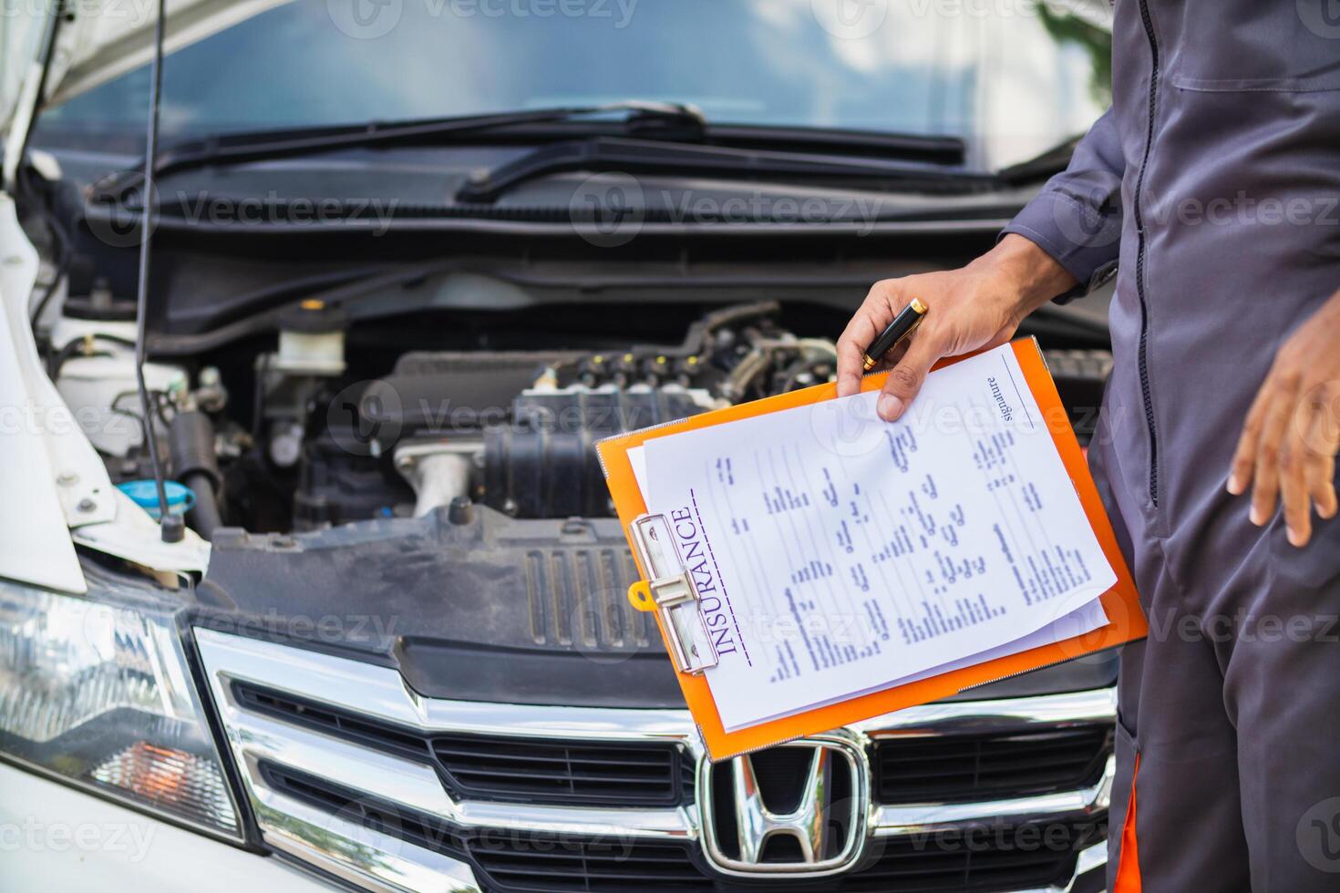 car service center mechanics are checking condition car and engine make sure they are ready use and in perfect condition according center warranty. periodic vehicle inspections for safety in driving. photo