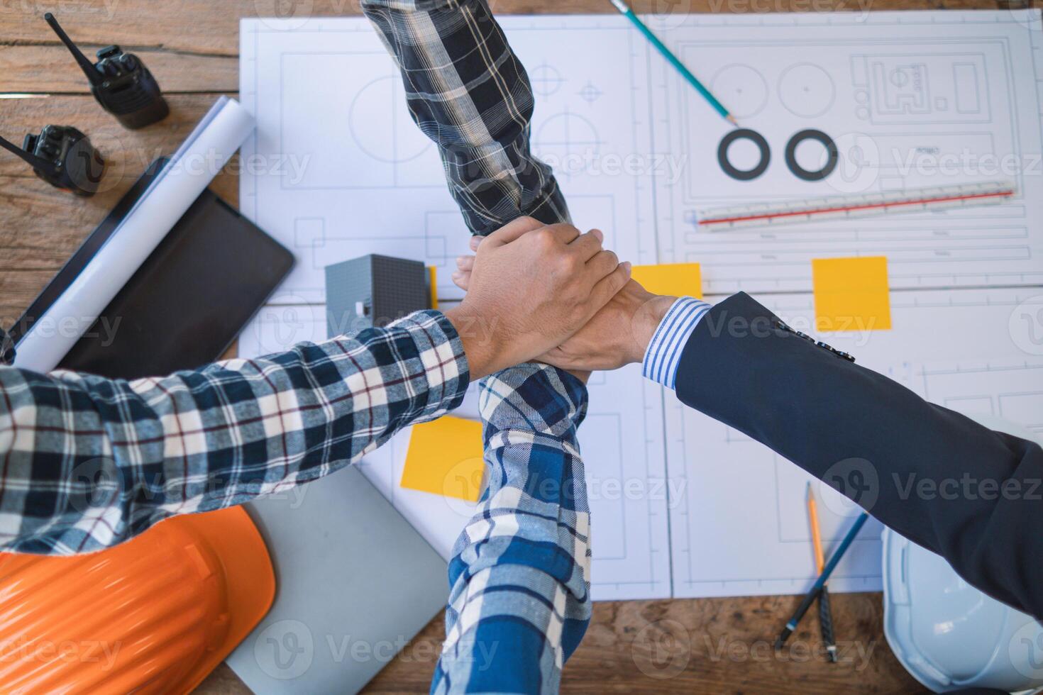 team of engineers and designers has come together to design an energy saving home or green energy home that uses natural energy such as wind turbines and solar cells to generate electricity for home. photo